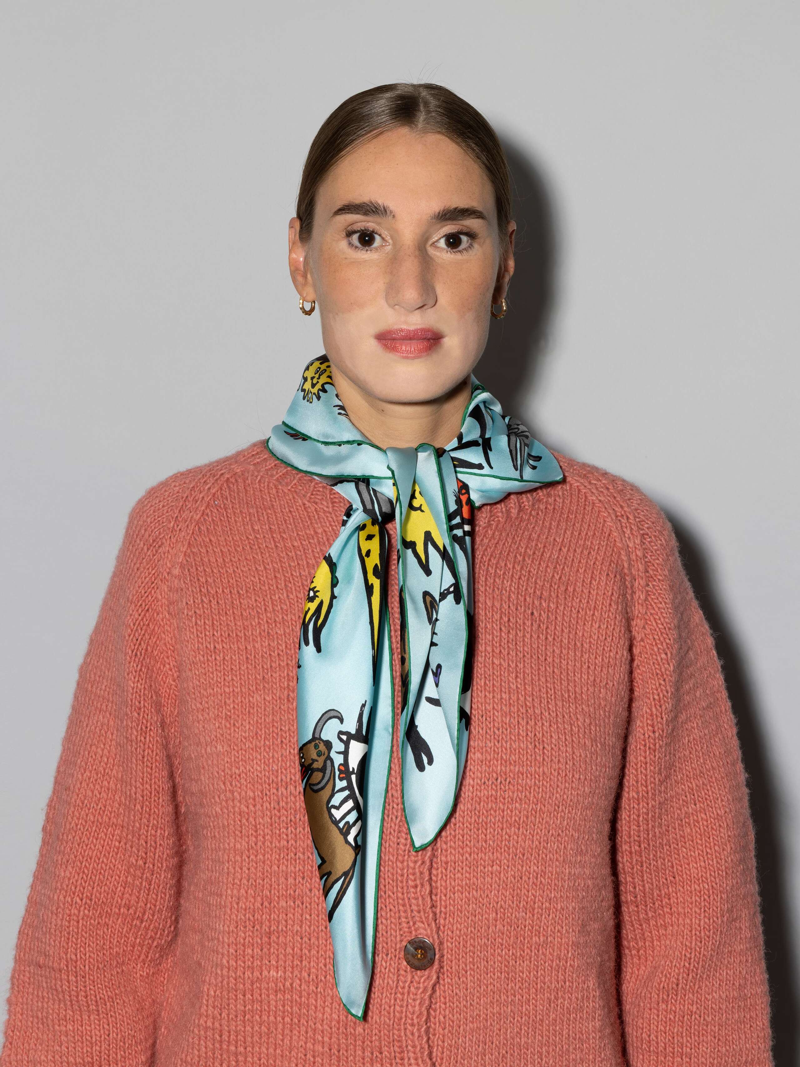 ensoie silk foulard in light blue with ojo de agua sun signature print 