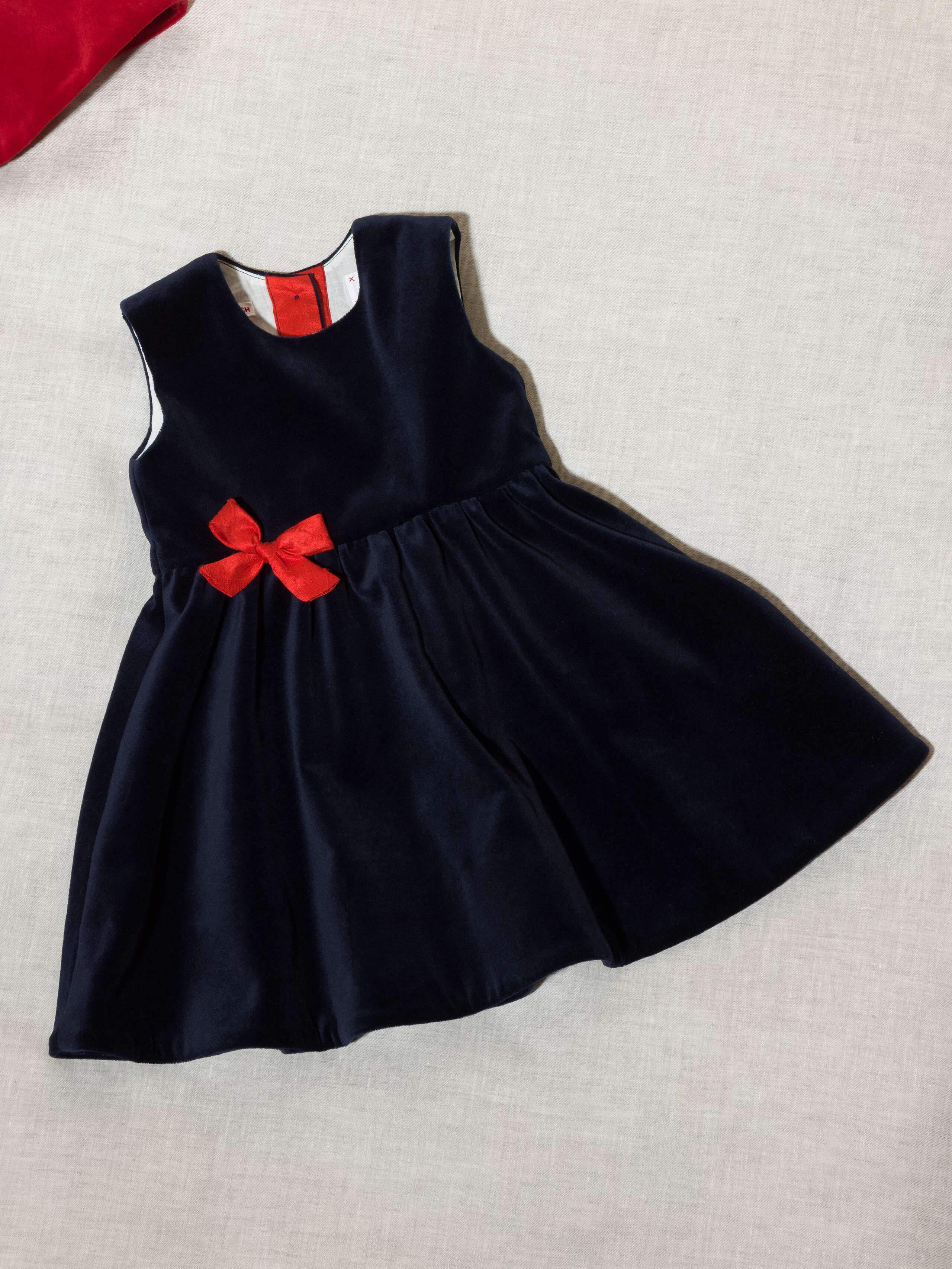 Beautiful cotton velvet baby dress sleeveless with red silk bow handmade in Zurich, navy cotton velvet