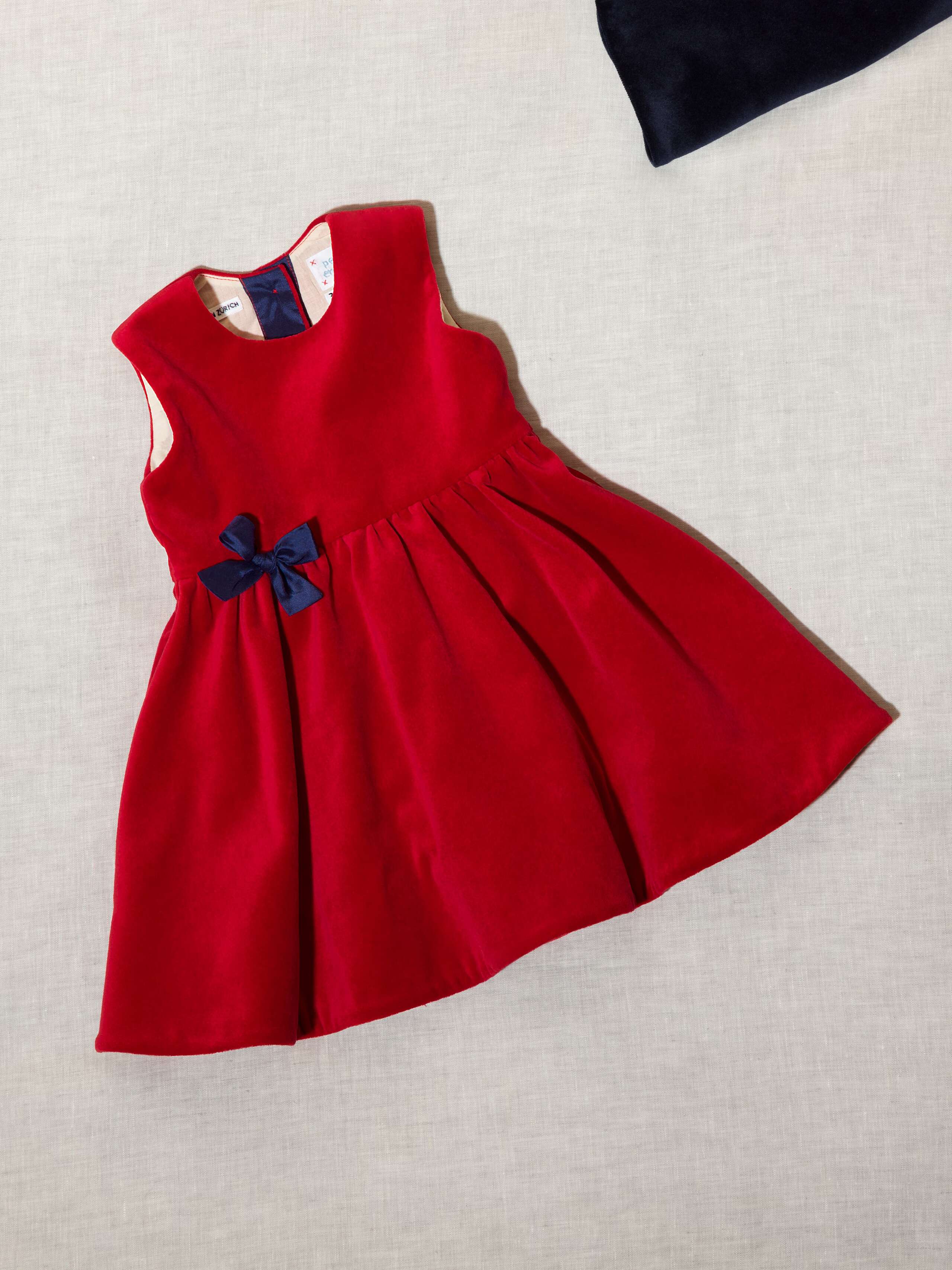 Beautiful cotton velvet baby dress sleeveless with navy silk bow handmade in Zurich, red cotton velvet