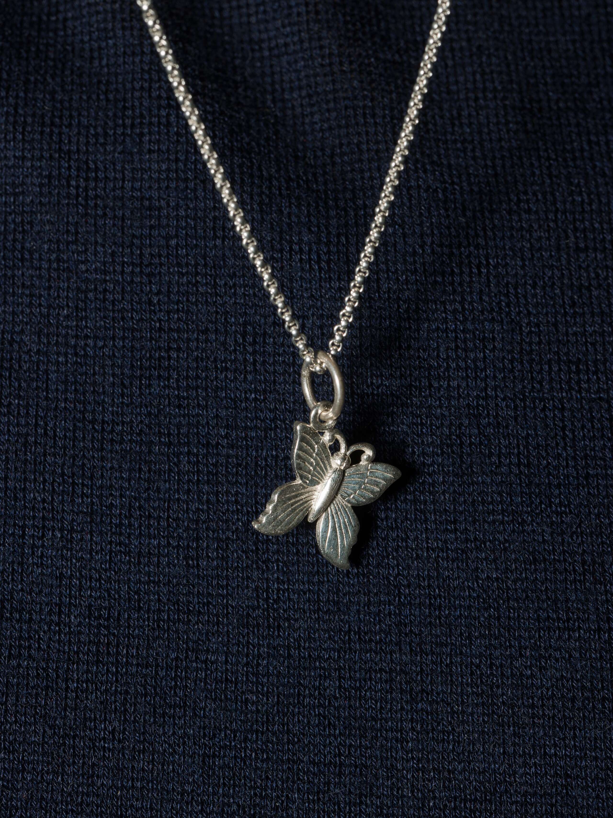 Picture of a cute butterfly pendent made of Sterling silver