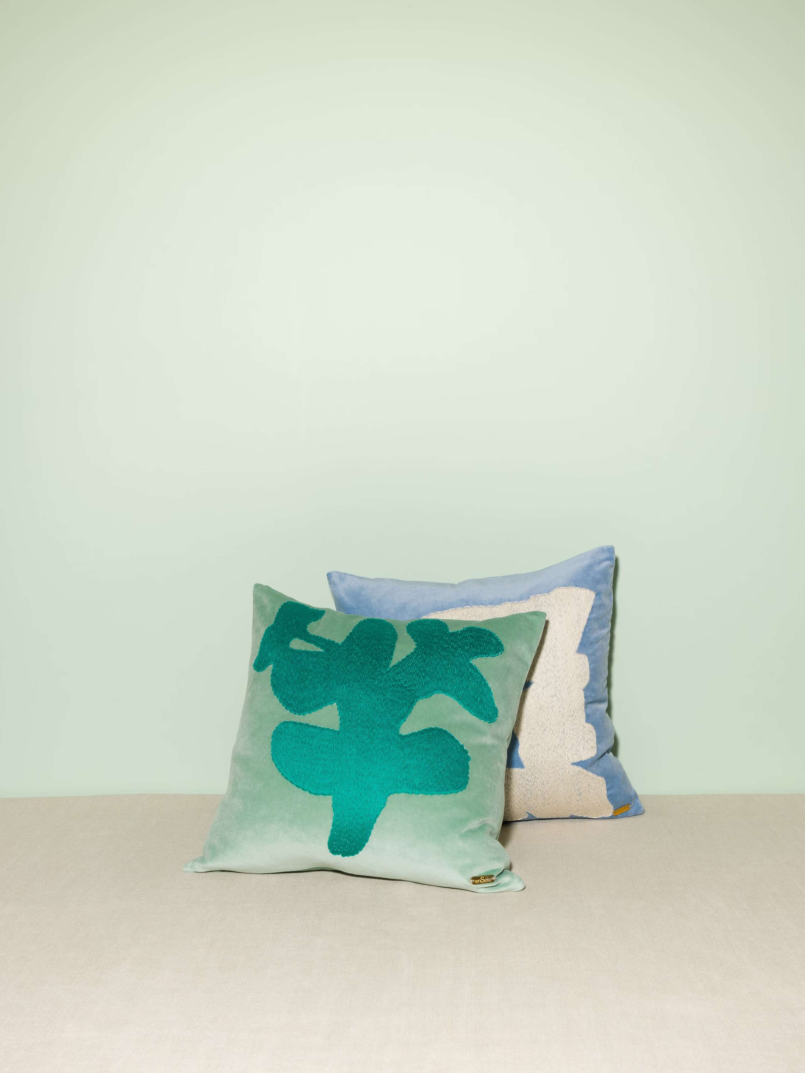 picture of the mint green cotton velvet pillow cover in abstract embroidery
