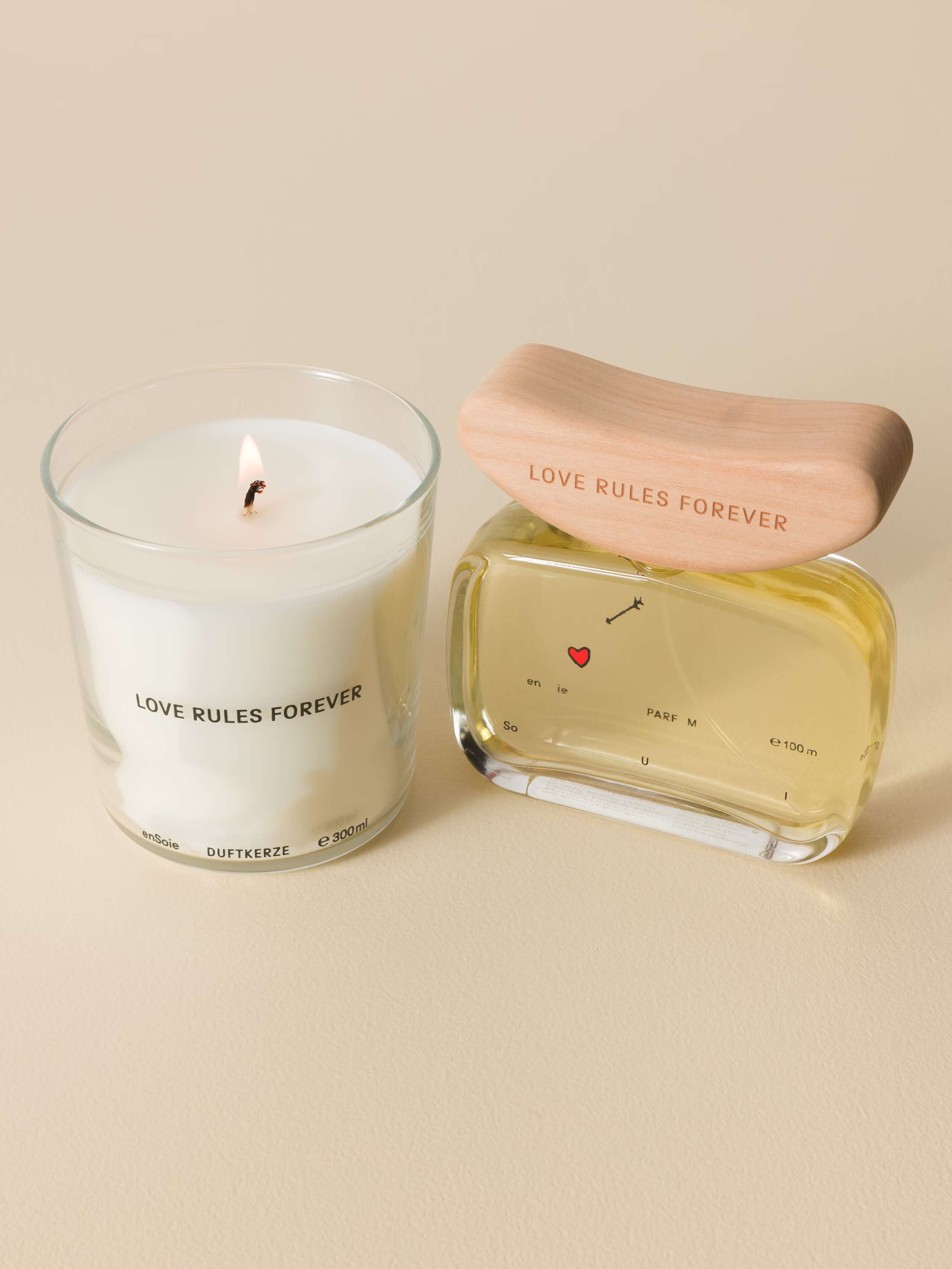 Picture of a beautiful scented candle and a perfume