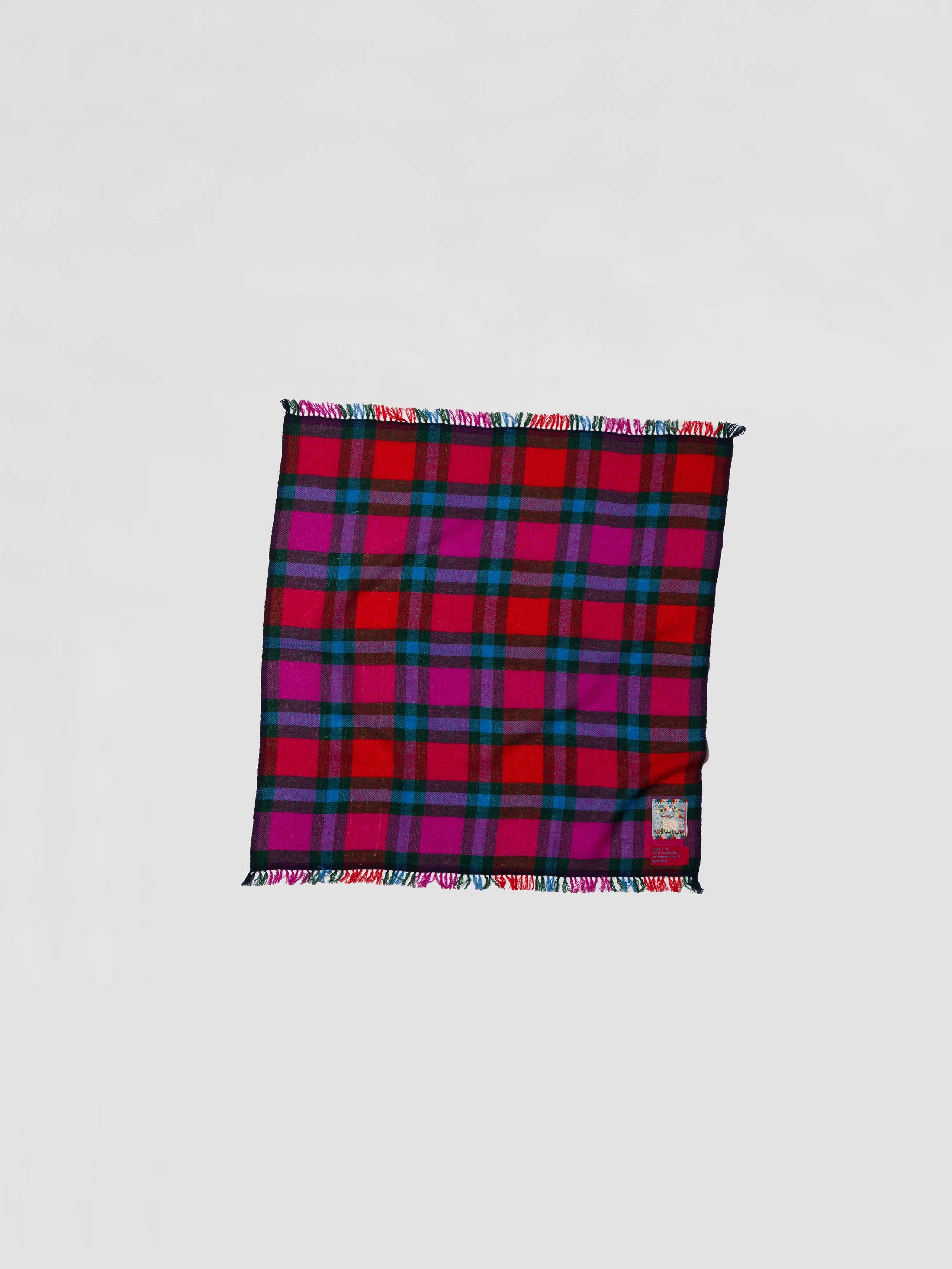 Picture of a classic check cashmere scarf in red, purple, blue and green shades