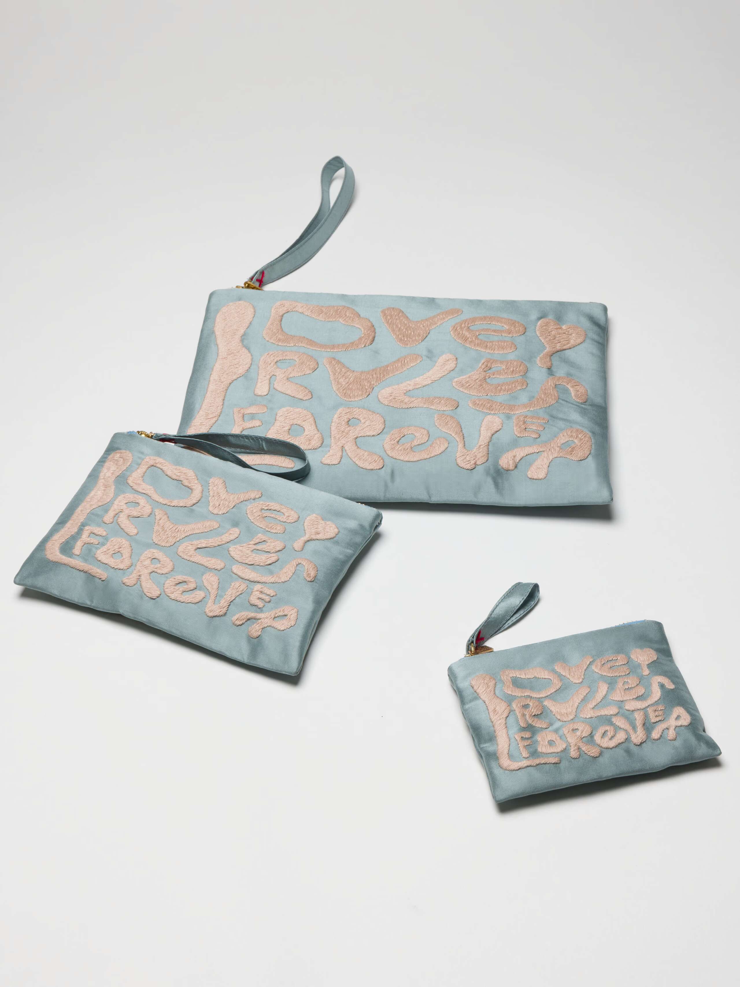 Love Rules forever pouches in light blue