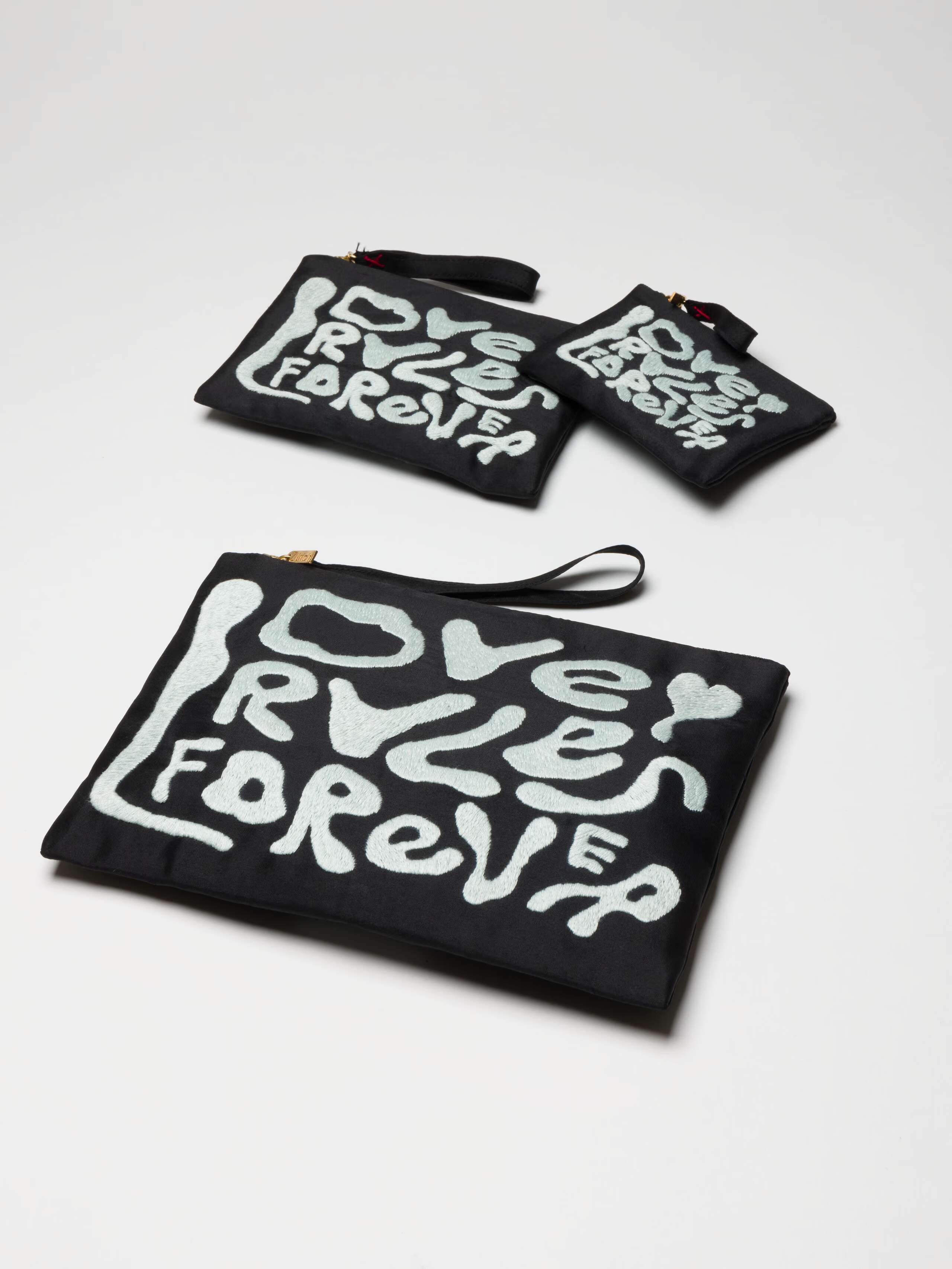 Love Rules forever pouches in black