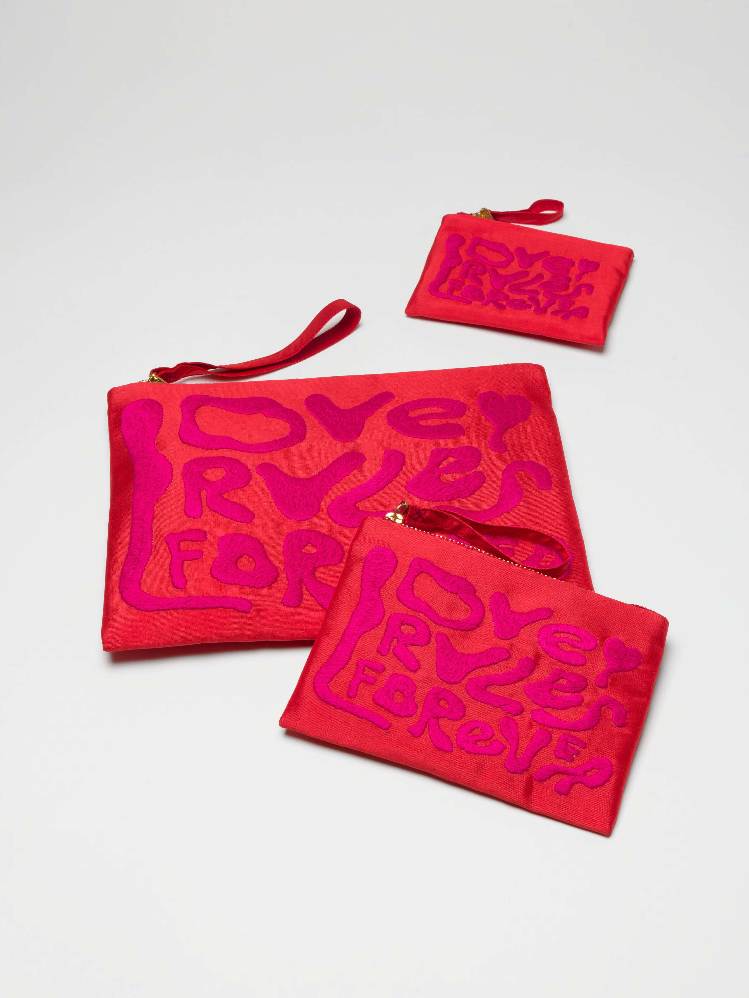 Love Rules forever pouches in red
