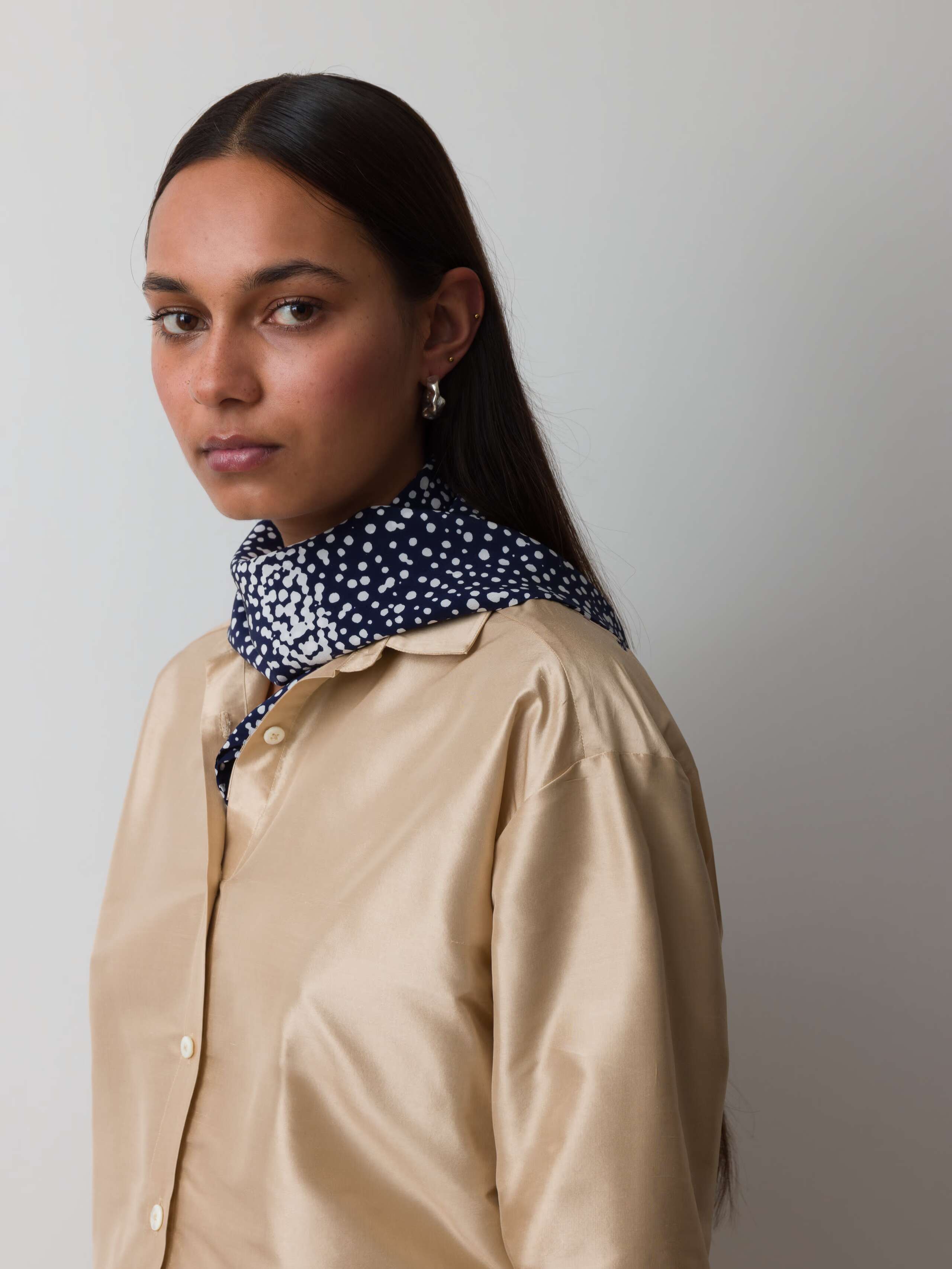Model wearing leo dot foulard in navy