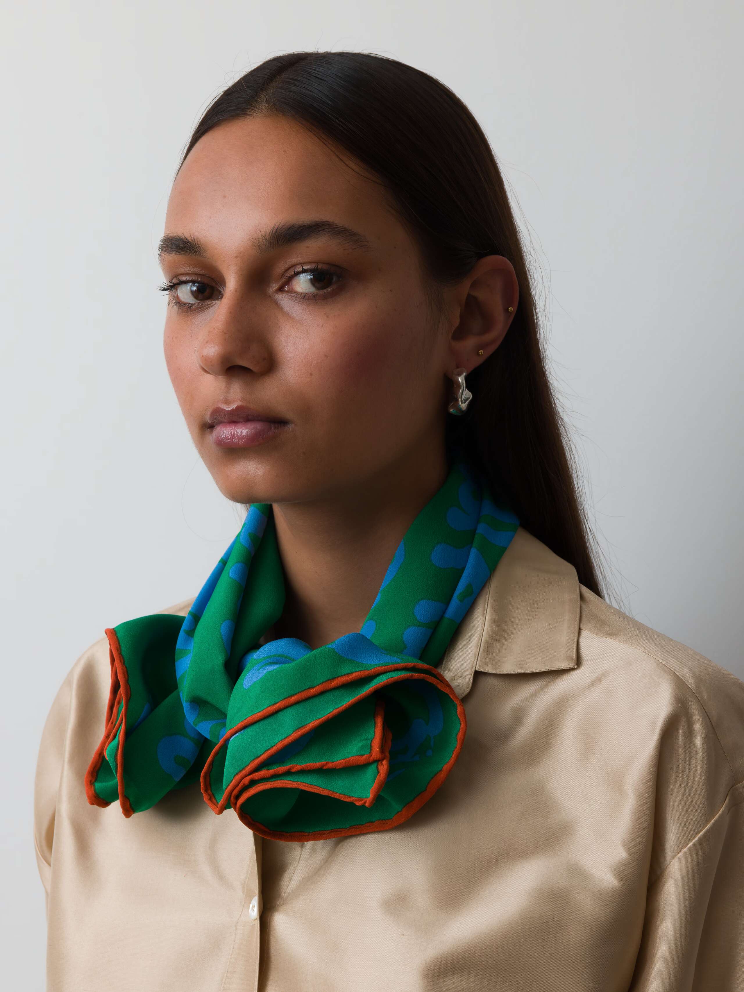 Model wearing proverb foulard in green blue