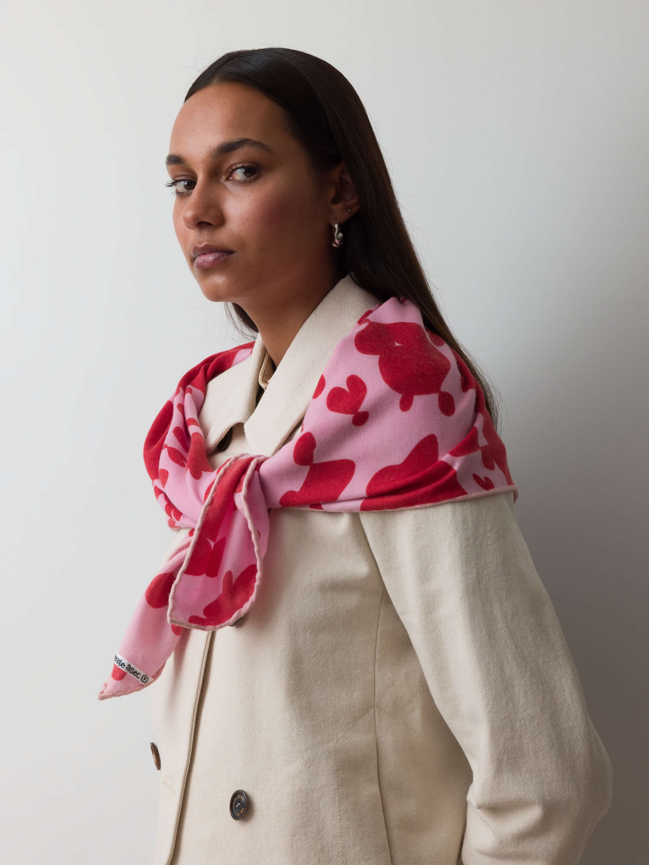 Model wearing wool foulard in pink red