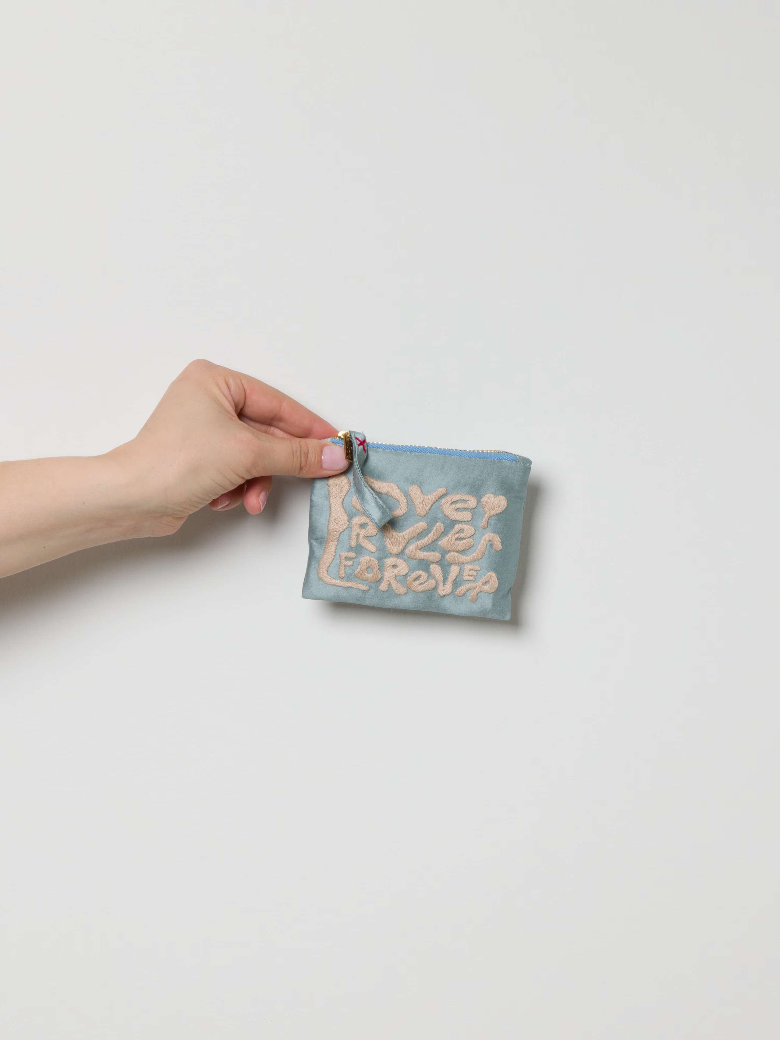 Love Rules forever pouches in light blue
