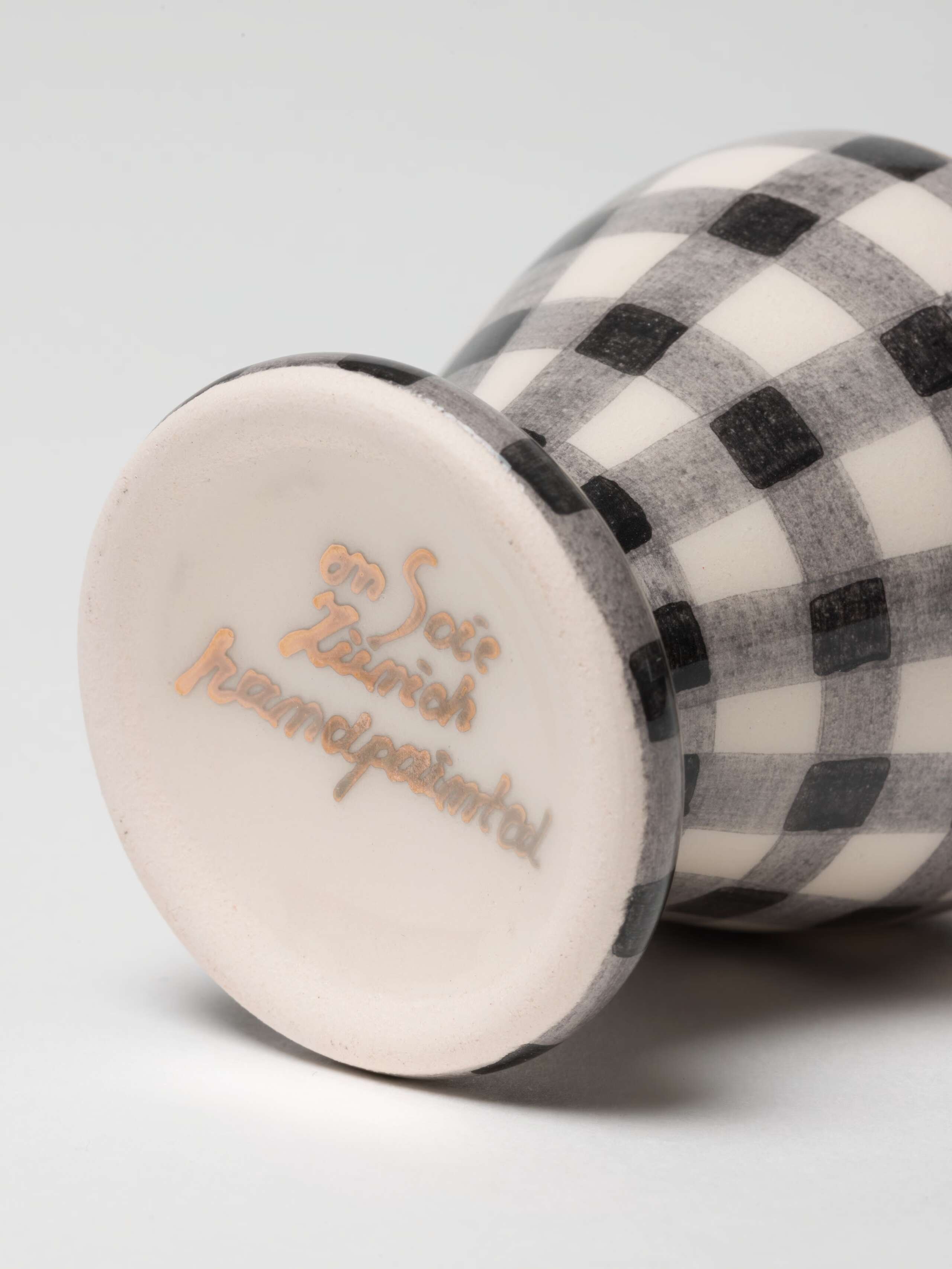 Close up Greta egg cup in black vichy
