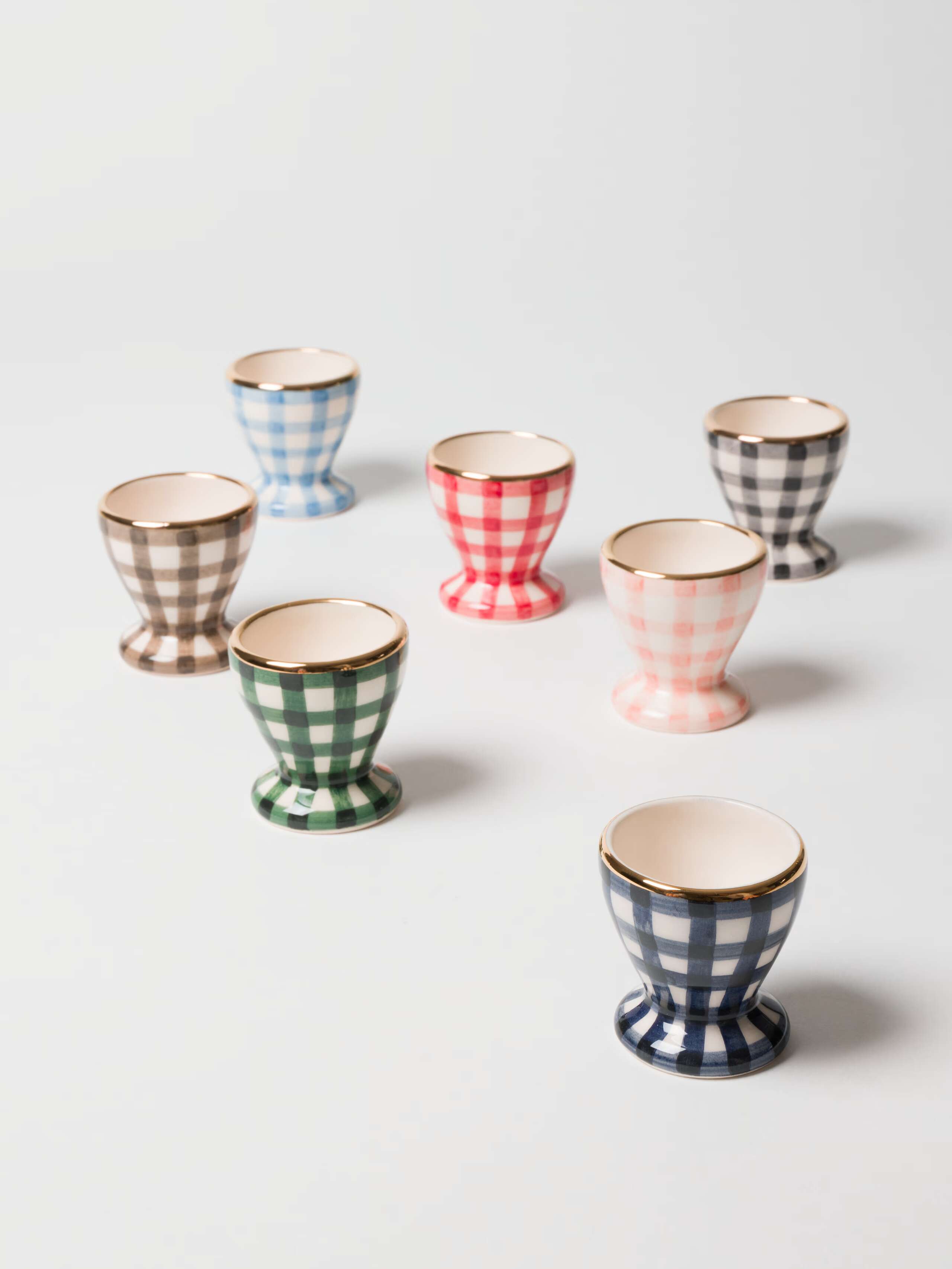 Overview of Greta Cup, vichy, in seven different colour variations