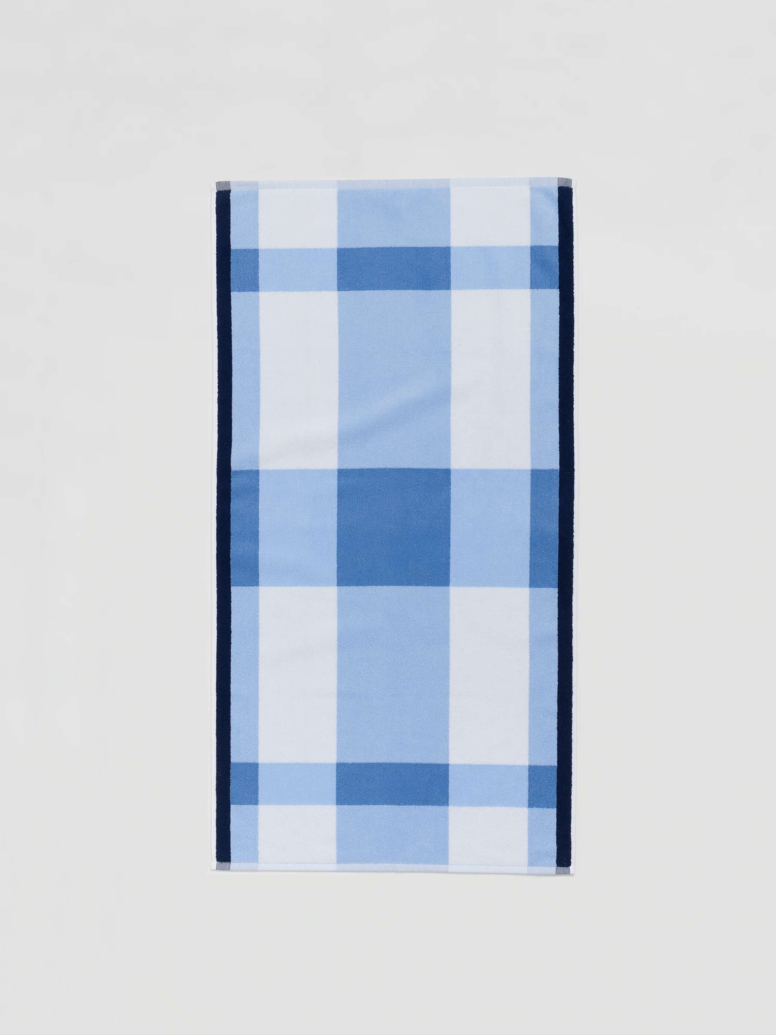 Terry bath towel in light blue vichy check with navy borders