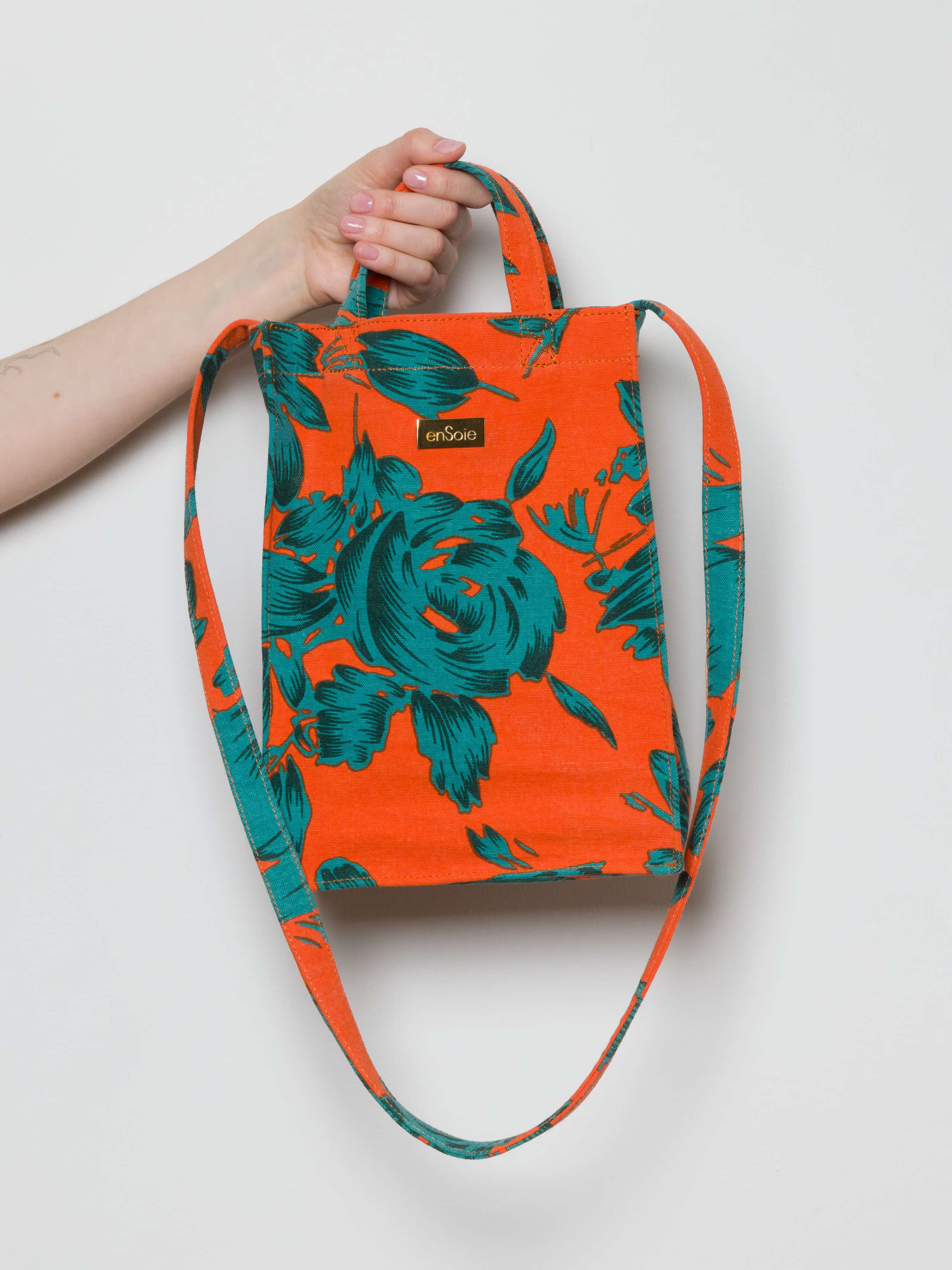 Cabas shopper bag printed with flower print in teal and orange in two sizes