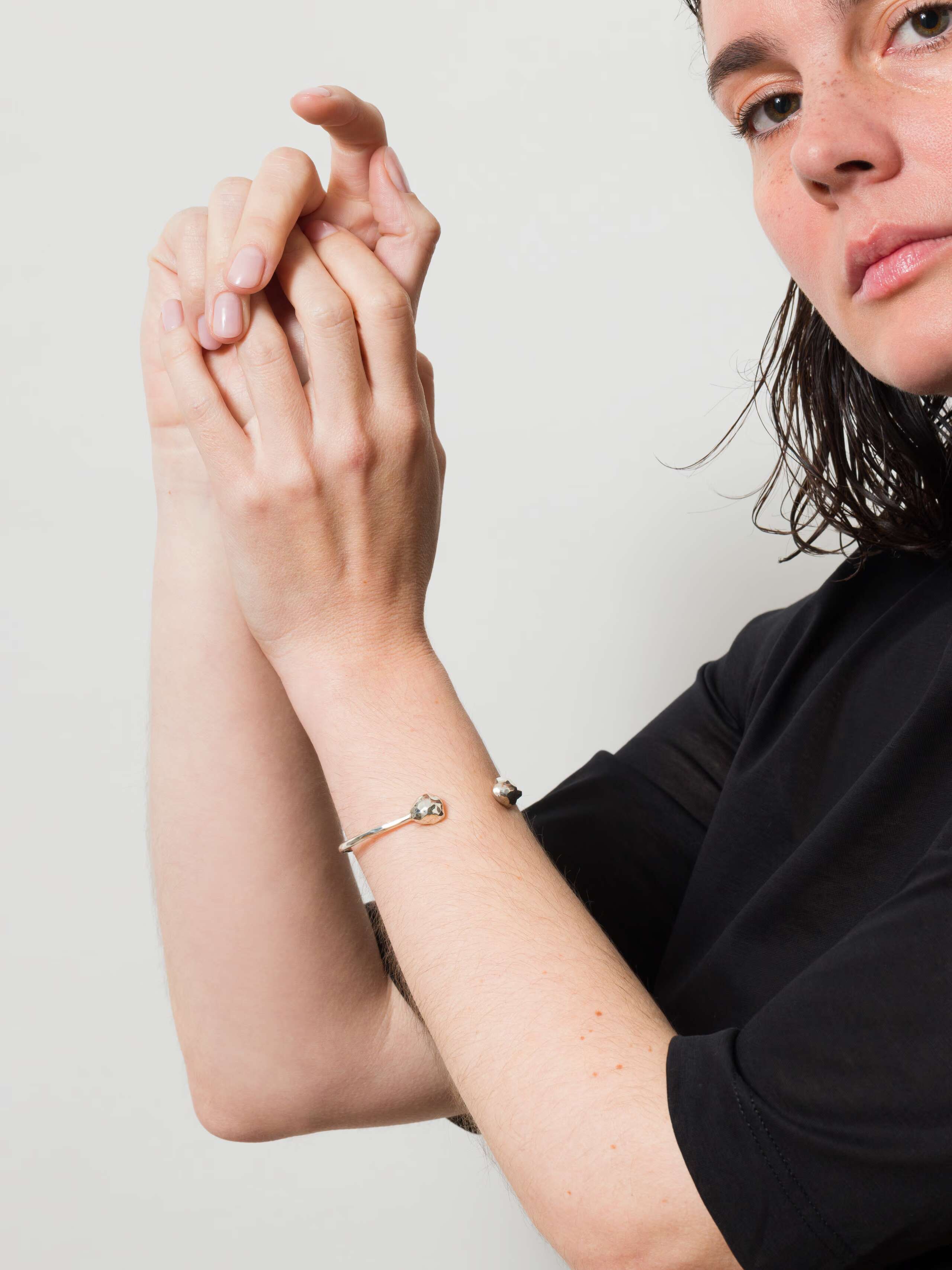 Model wearing eleonore bangle fine