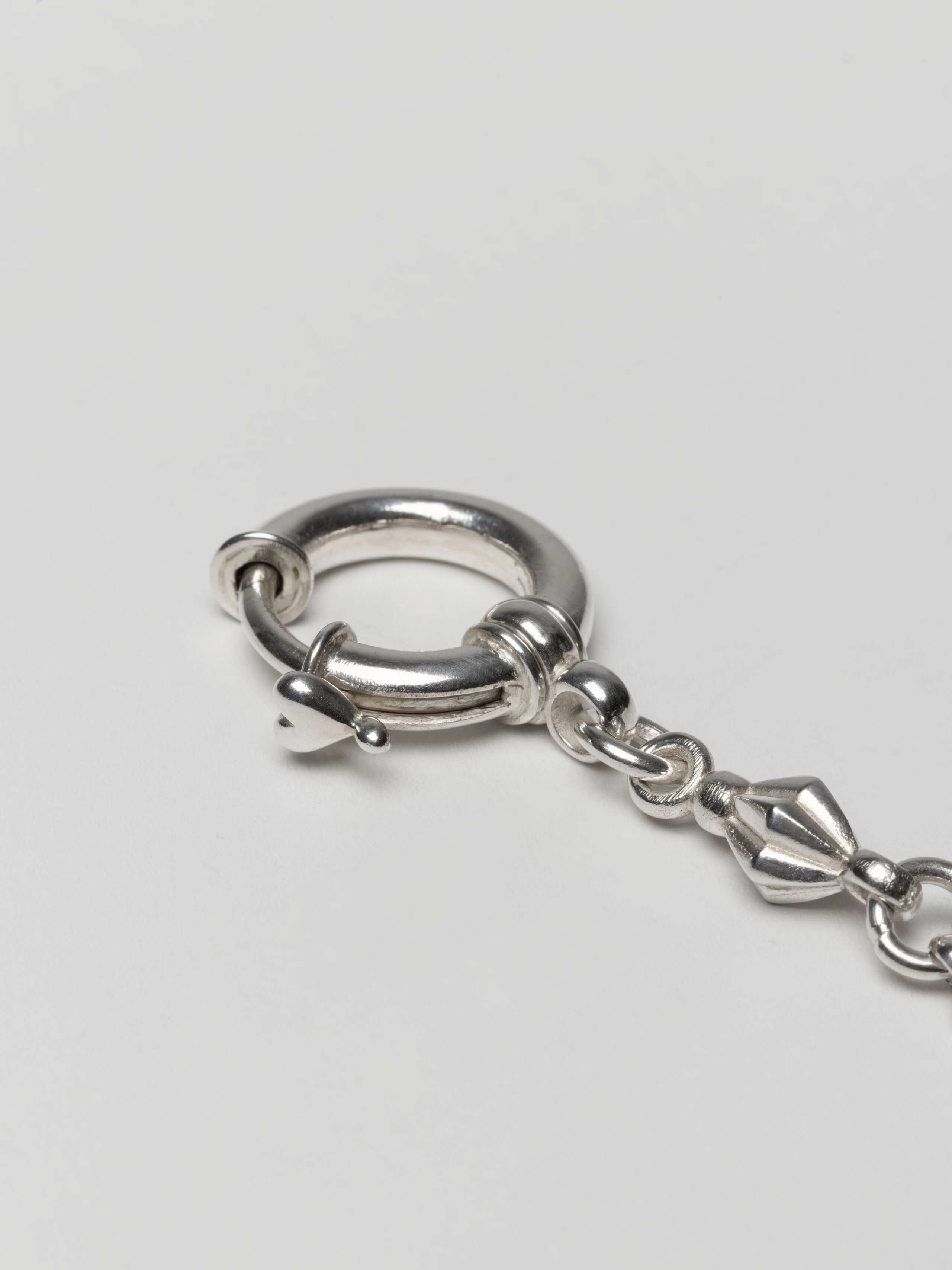 closing close up of small ball bracelet