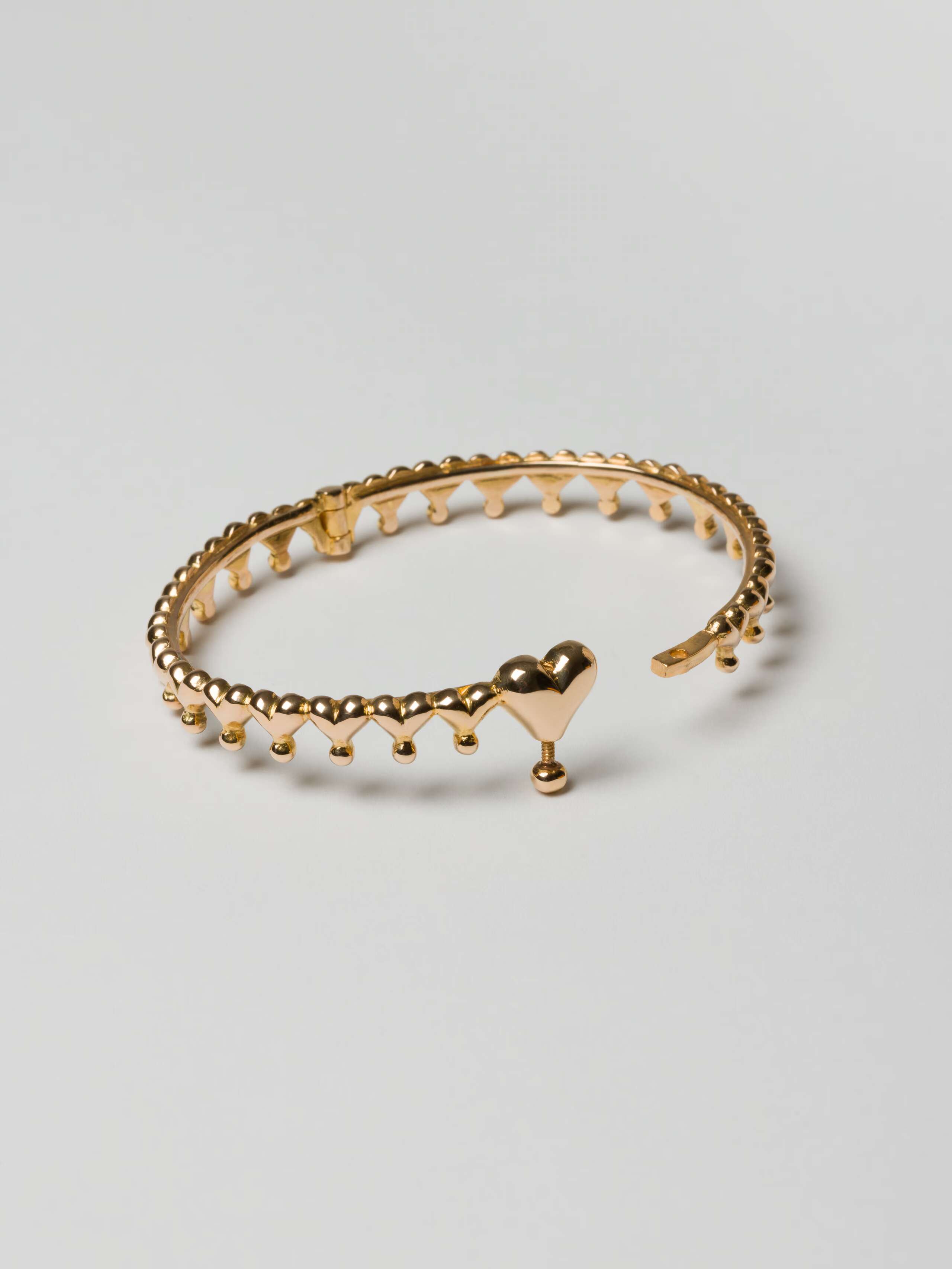 Infinite Love bangle in 18 karat gold