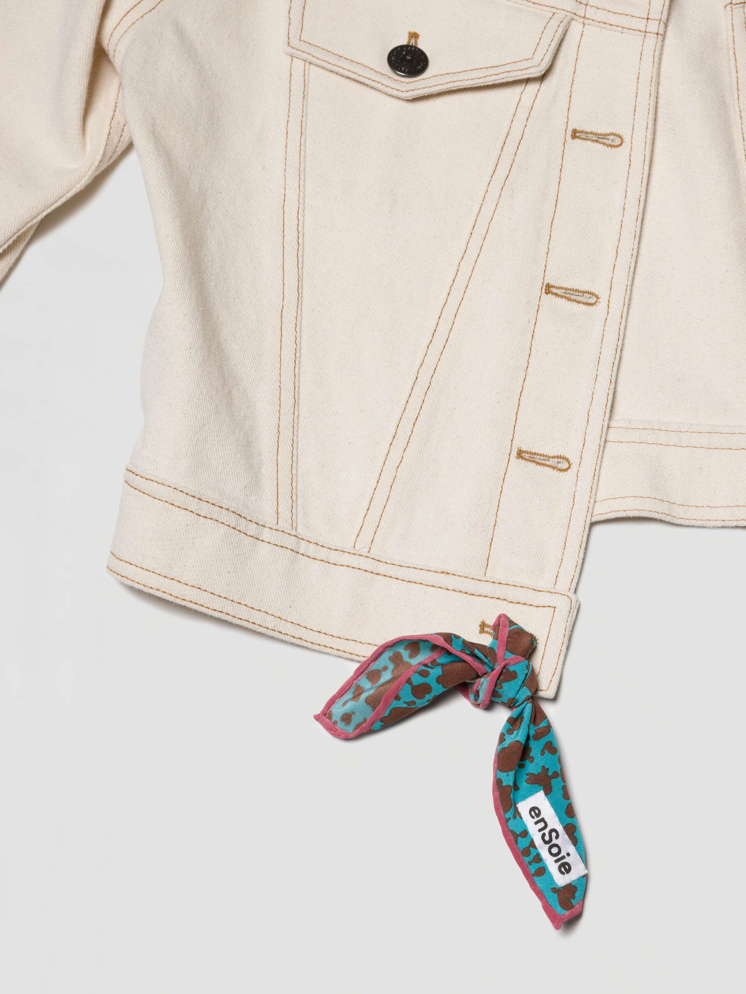 Carré foulard 20 decorated in last button hole on jeans jacket