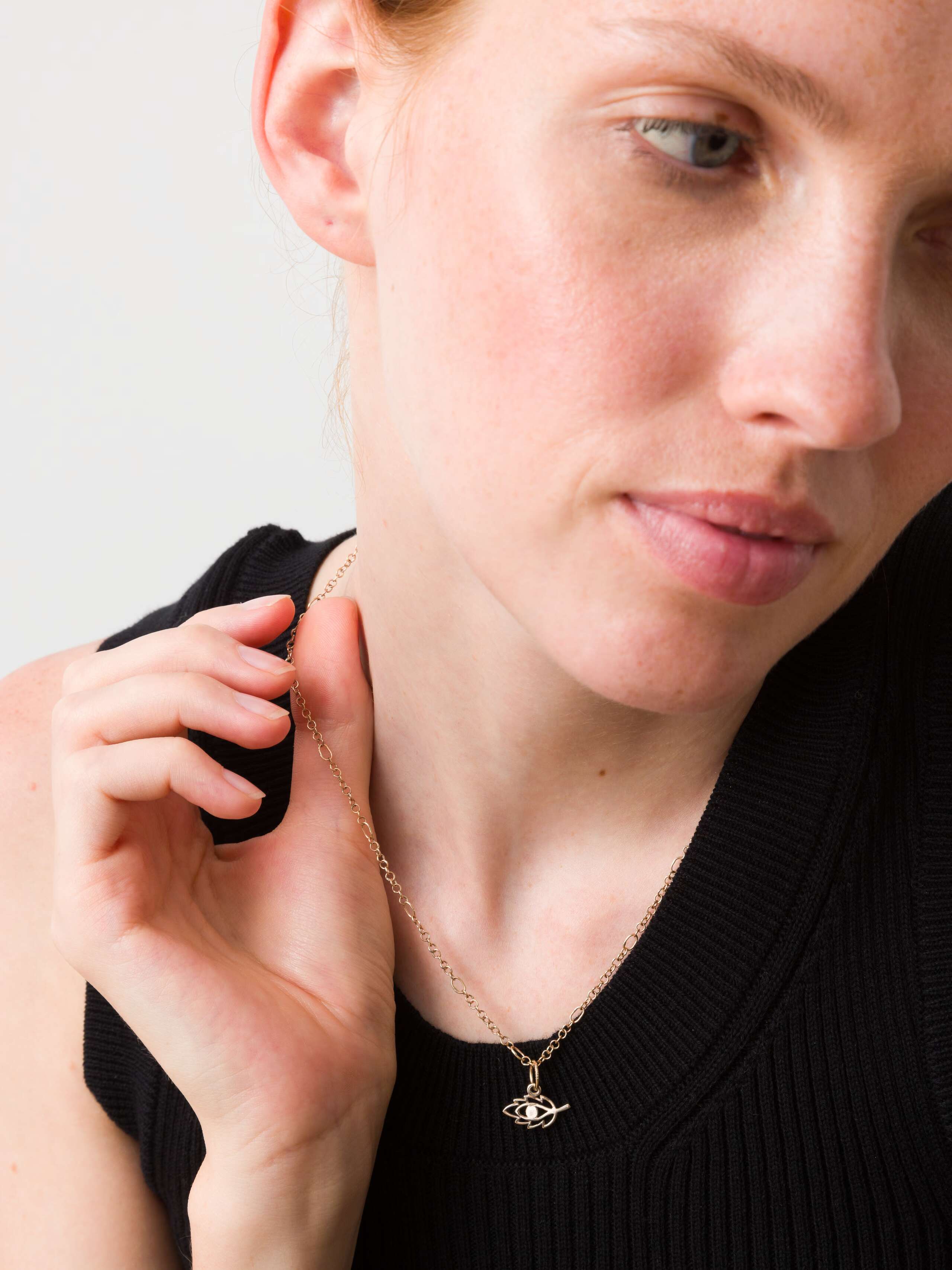 respect nature pendant worn by model