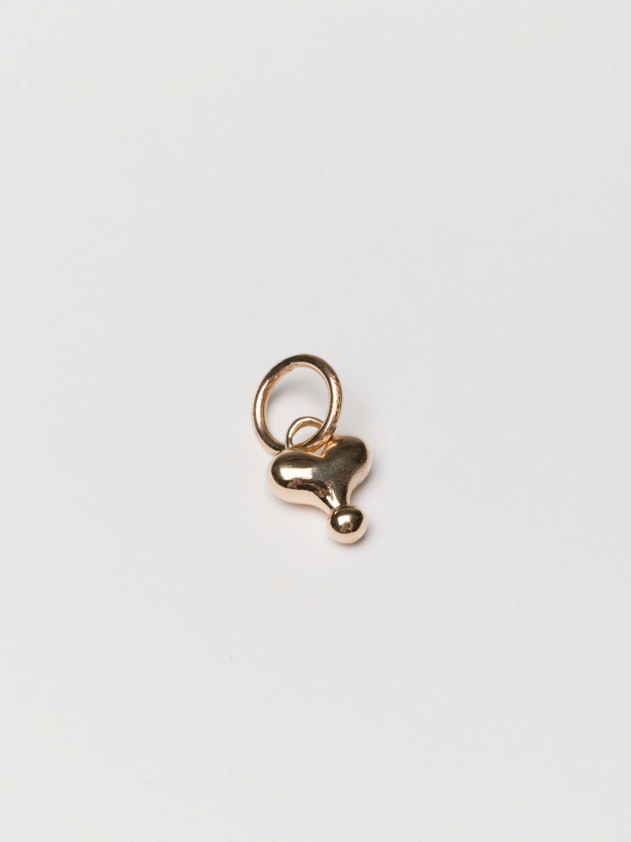 Mini heart pendant in 9 karat gold