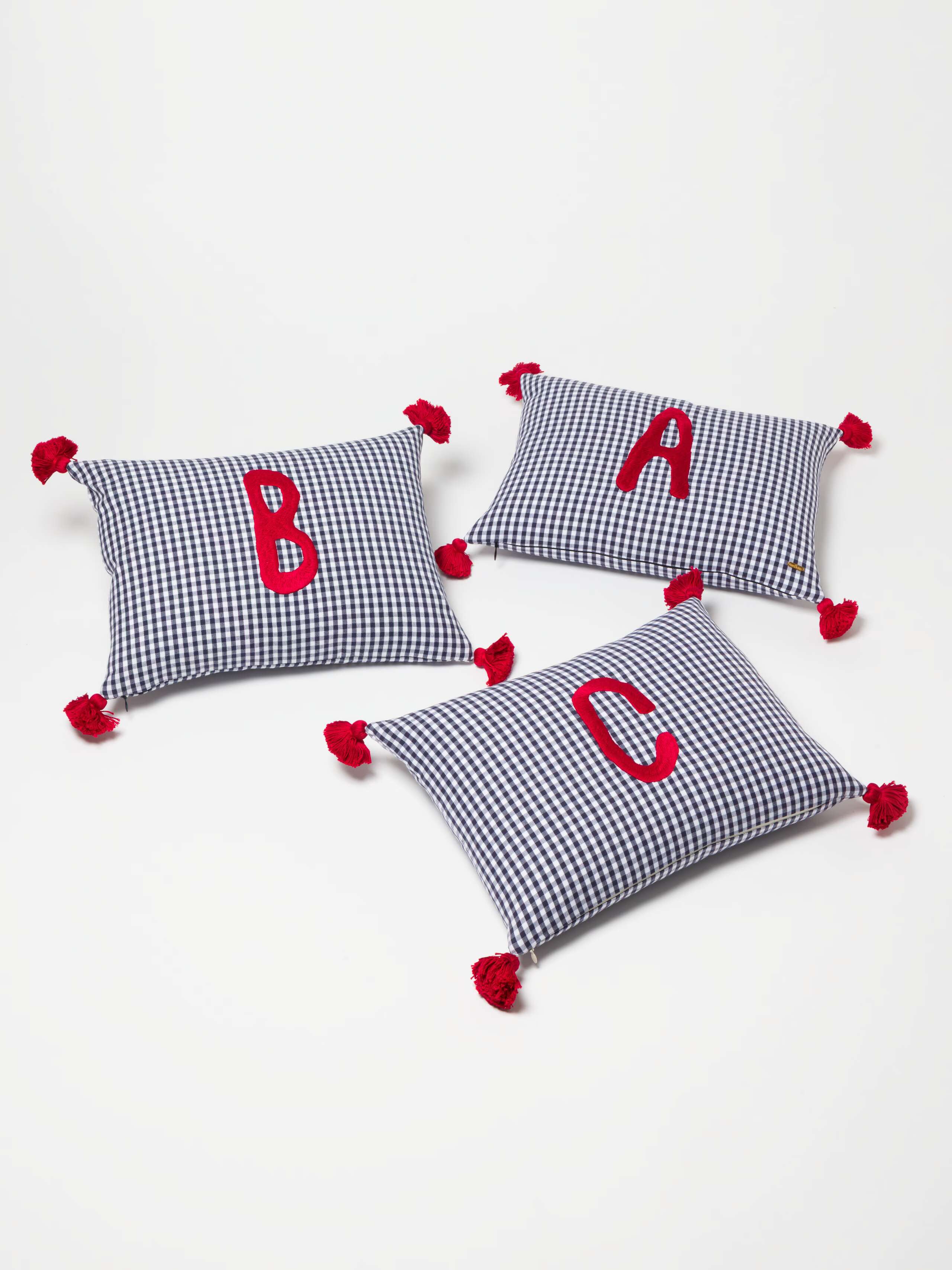 Alphabet Pillows in Zurich Navy with red embroidery