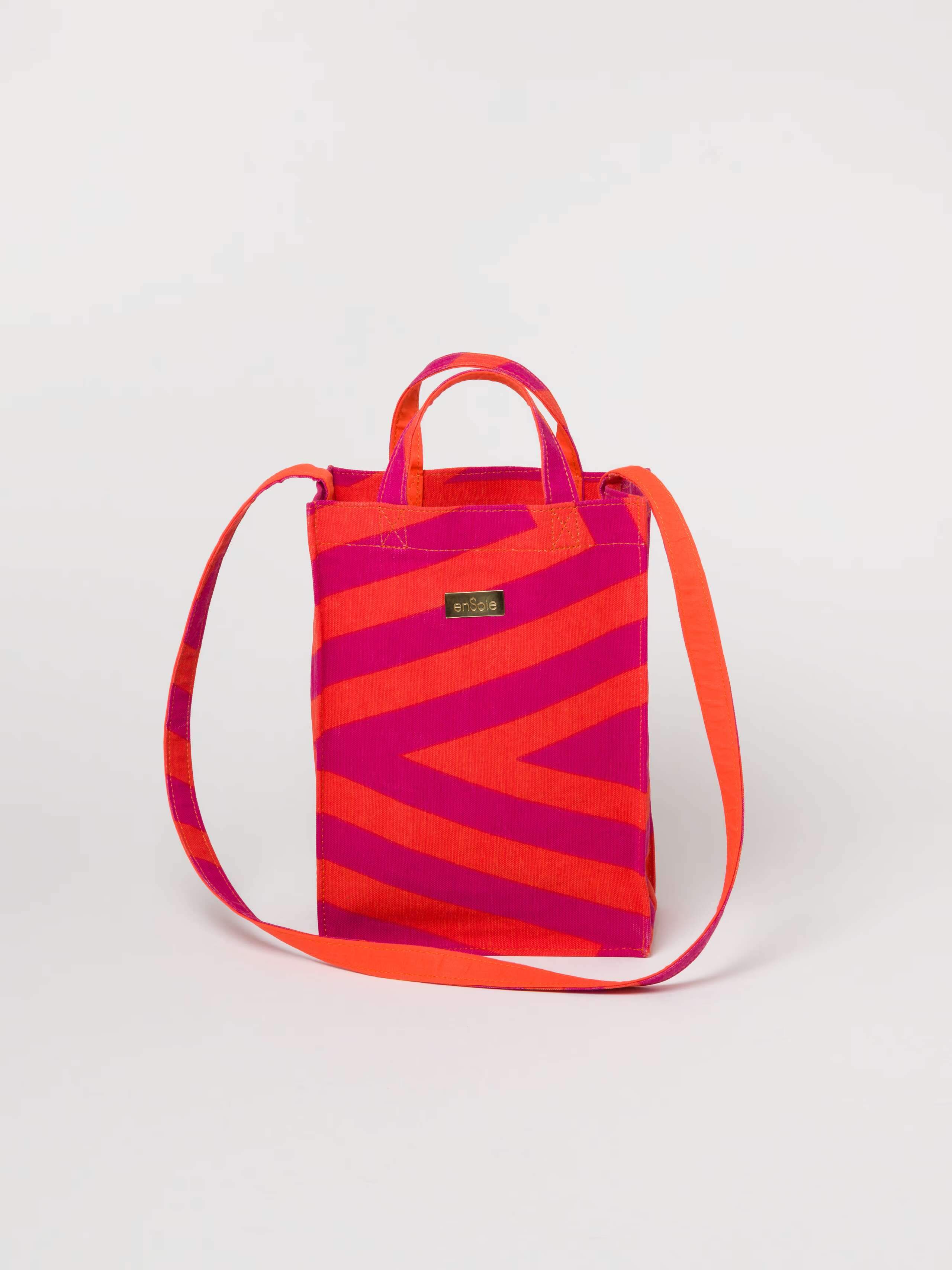 Picture of a canvas bag in pink and orange shades
