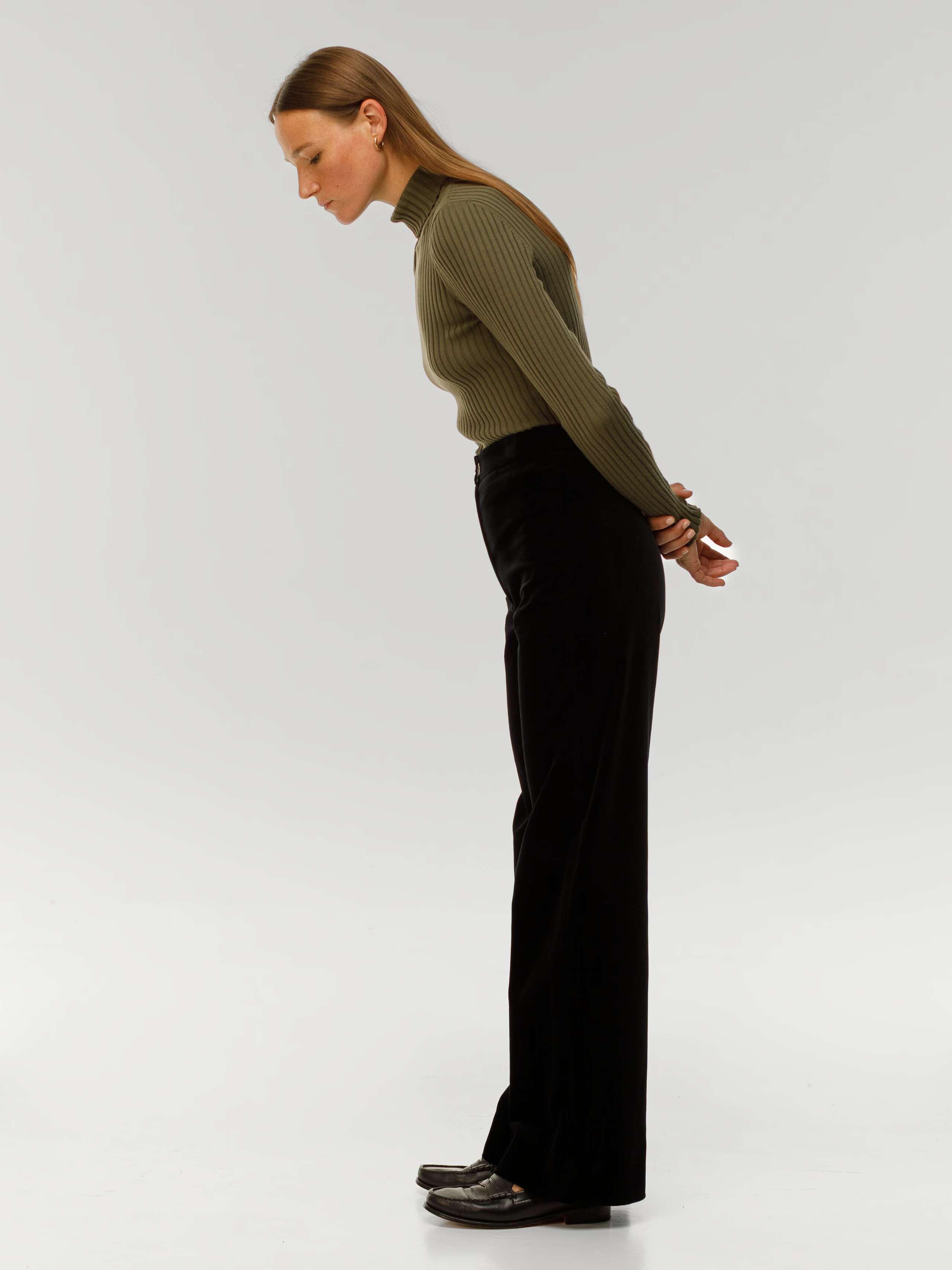 Amy trousers in black cotton velvet worn by model