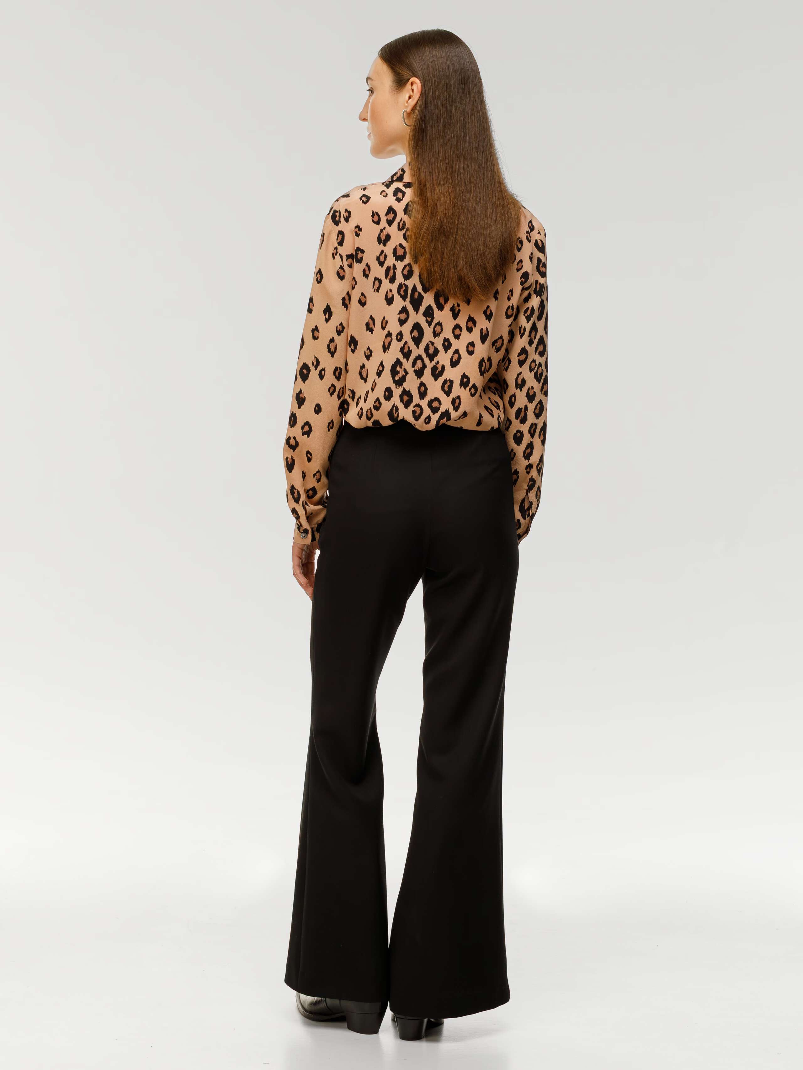 Angela trousers in black wool gabardine worn by model