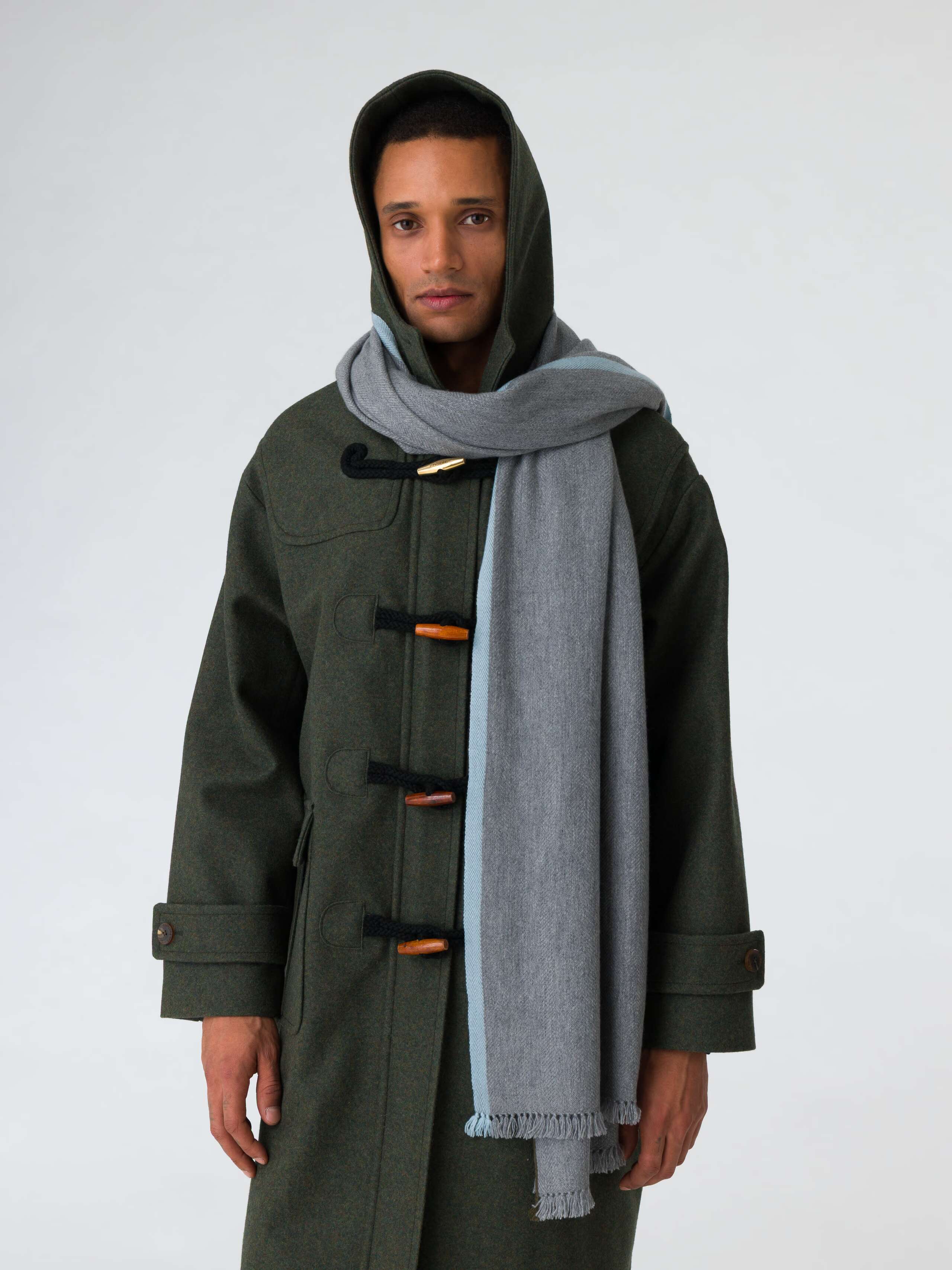 Picture of a man wearing a grey cashmere stole
