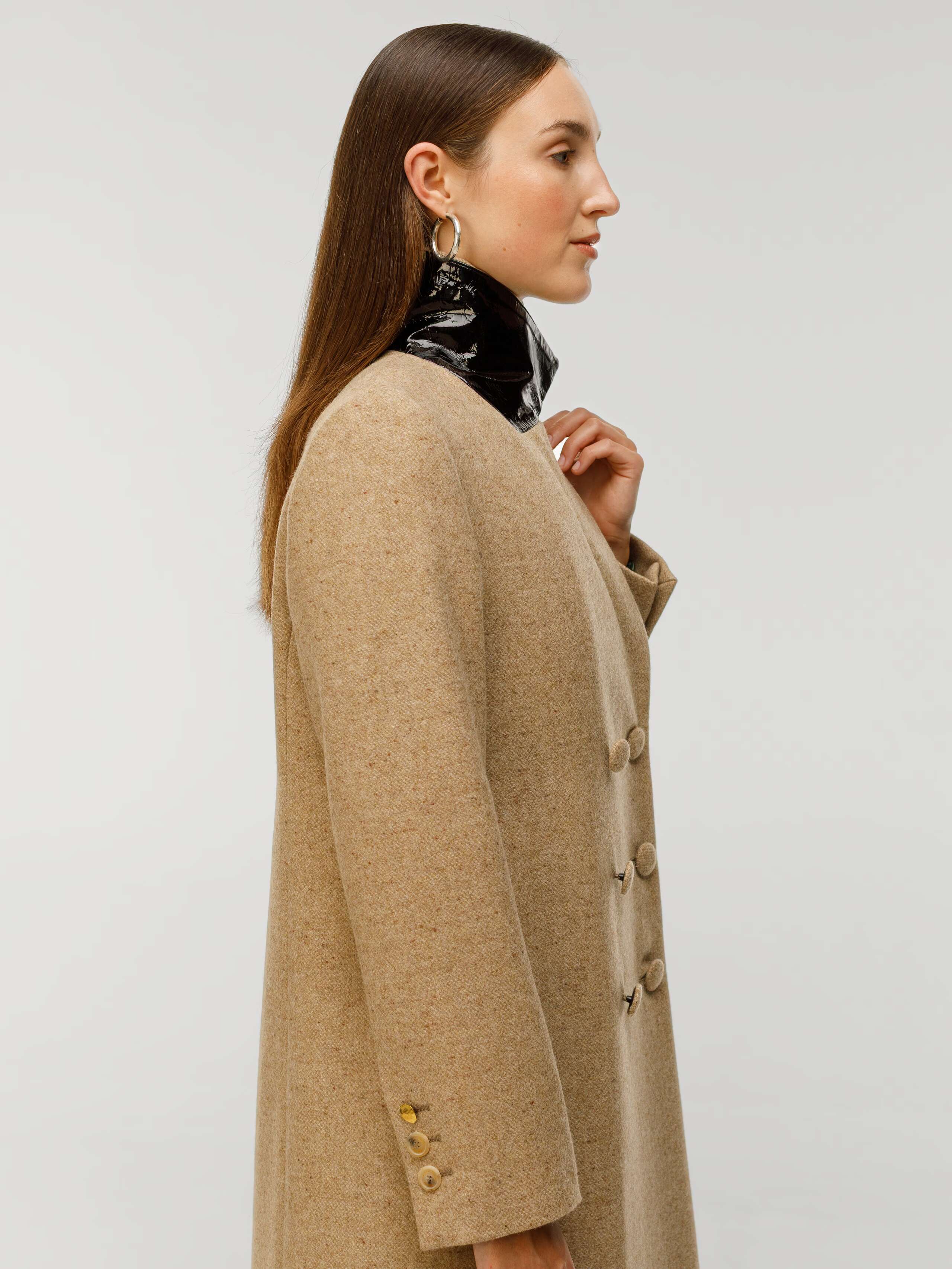 Milla coat in beige donegal wool worn by model