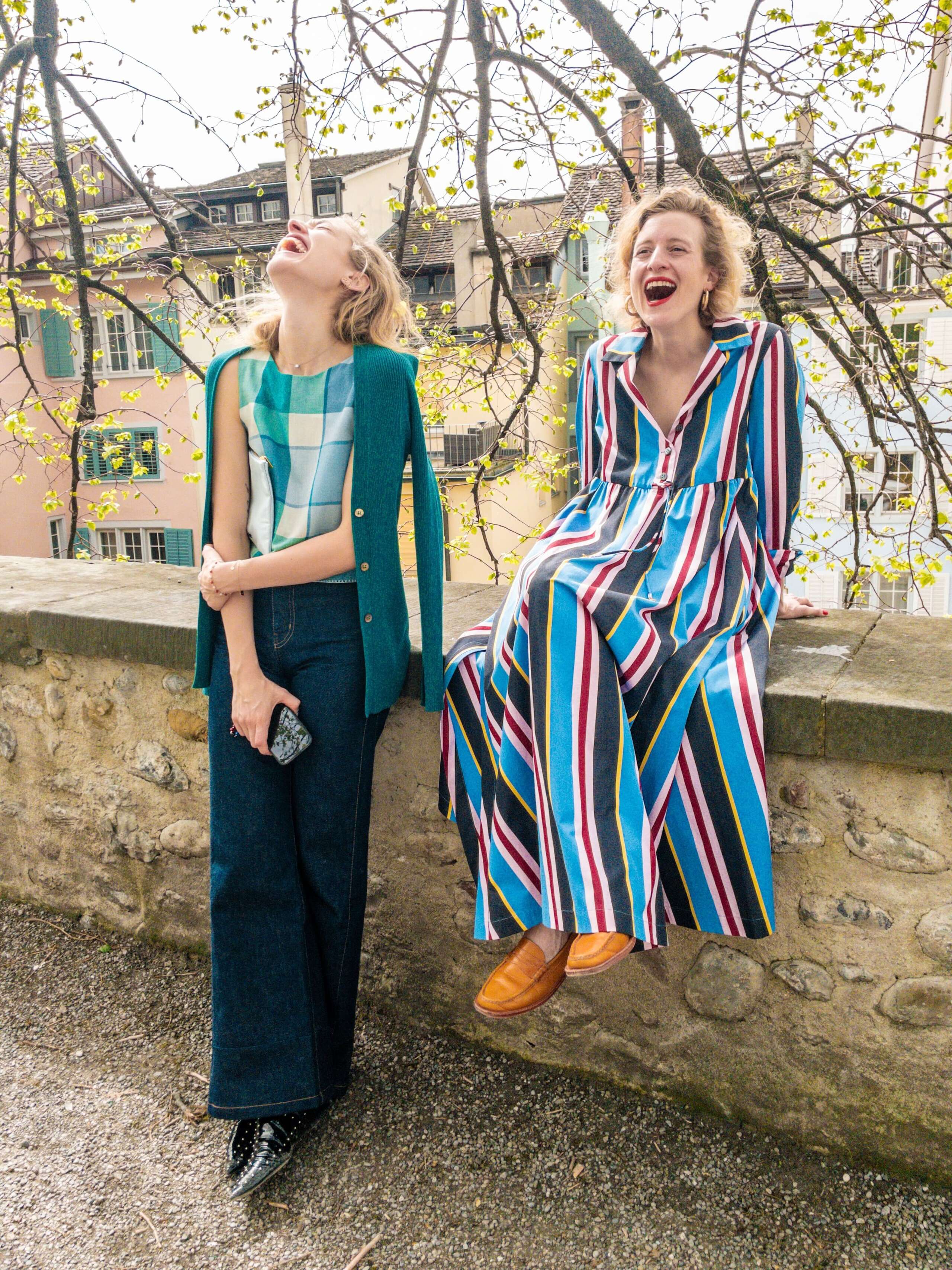 Picture of two women sitting outdoor on a sunny day