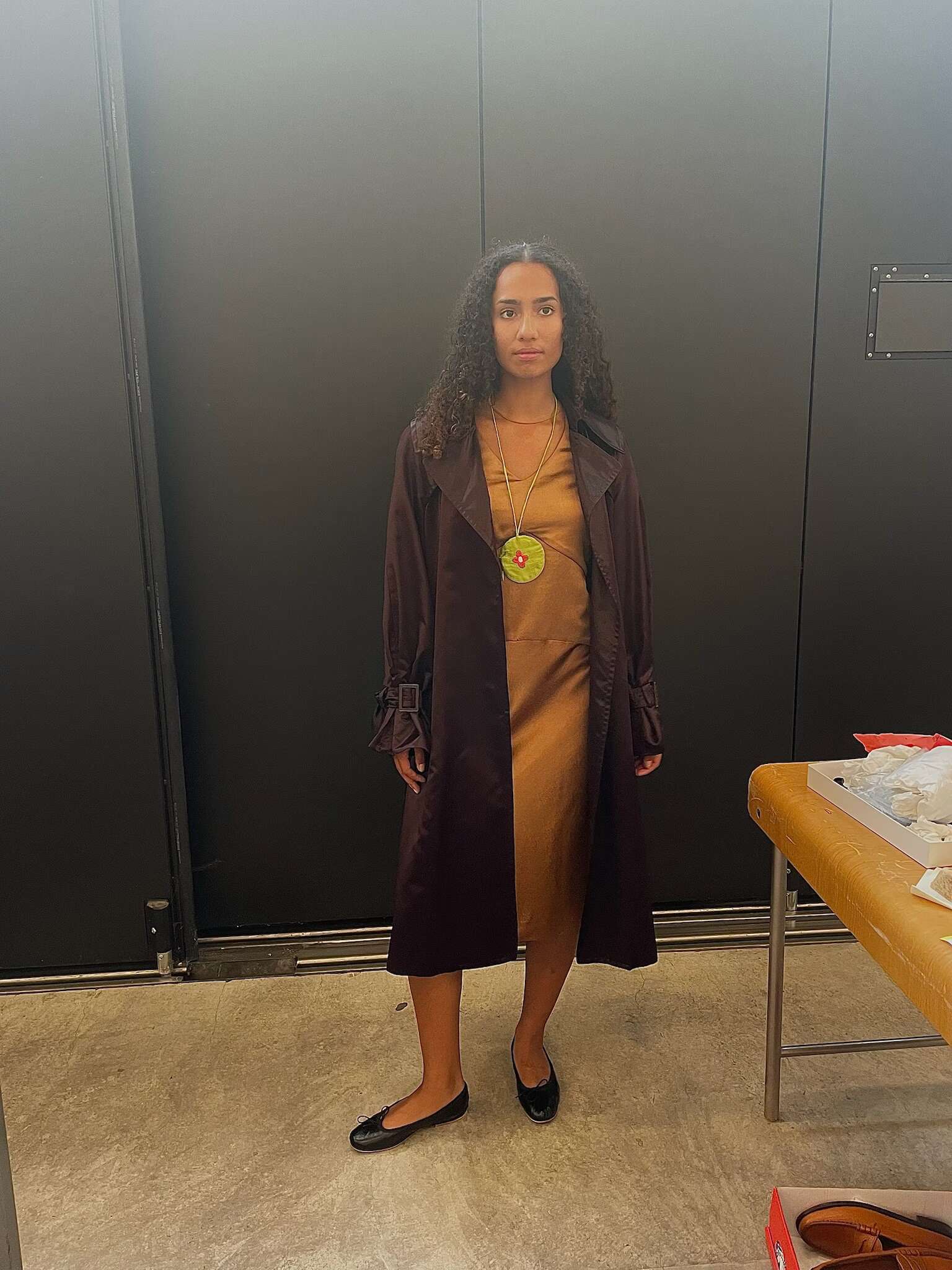 Picture of a model in the backstage of a fashion show