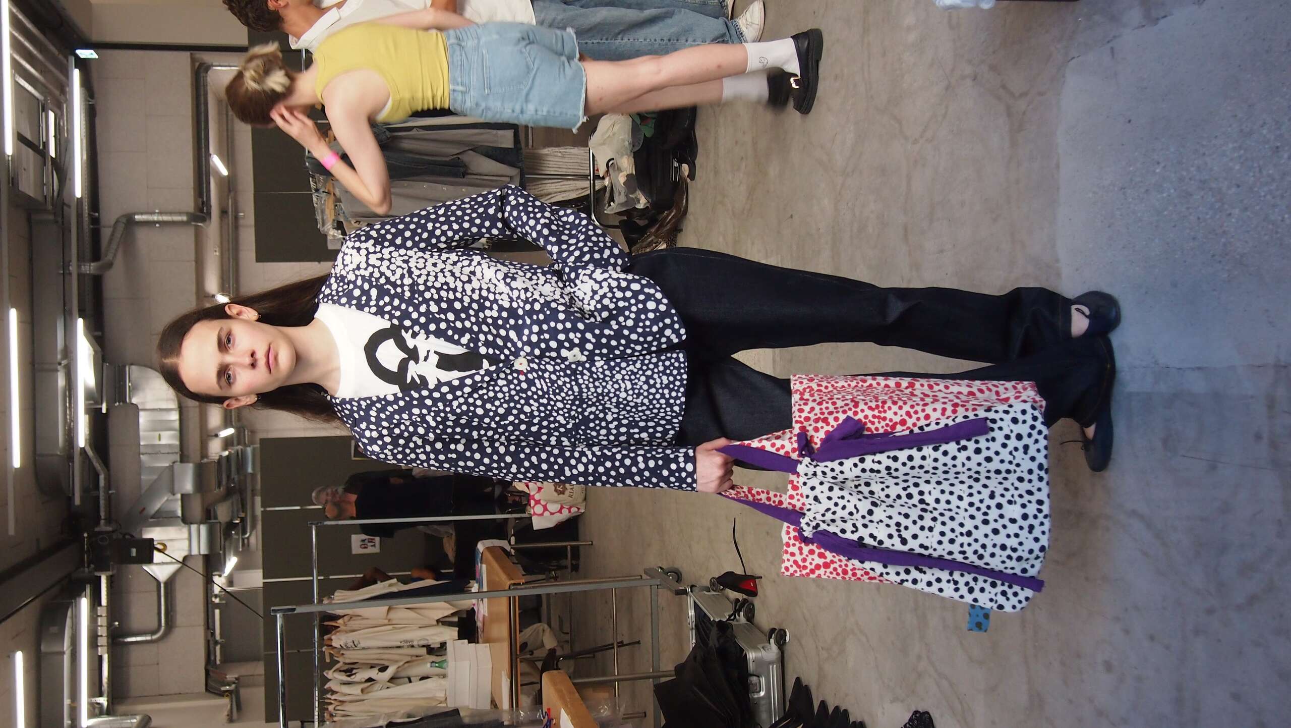 Picture of a model in the backstage of a fashion show