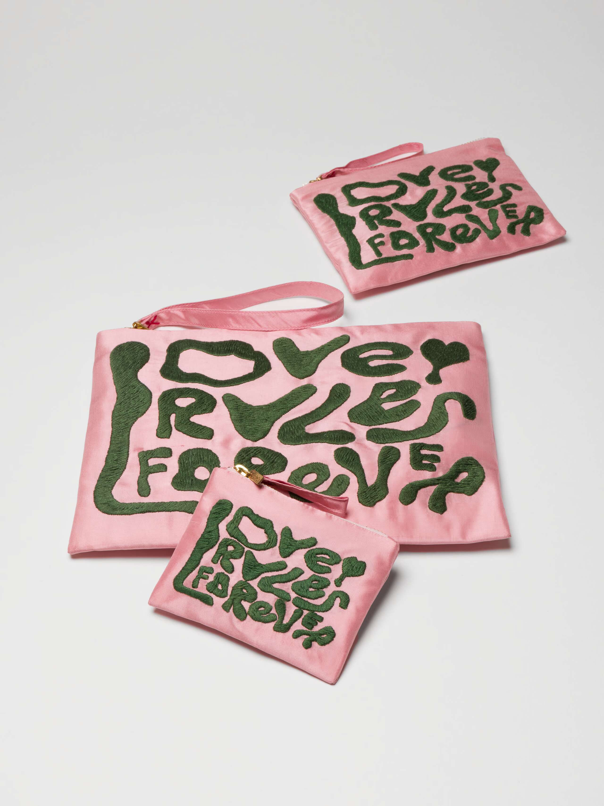 Love Rules forever pouches in rose pink