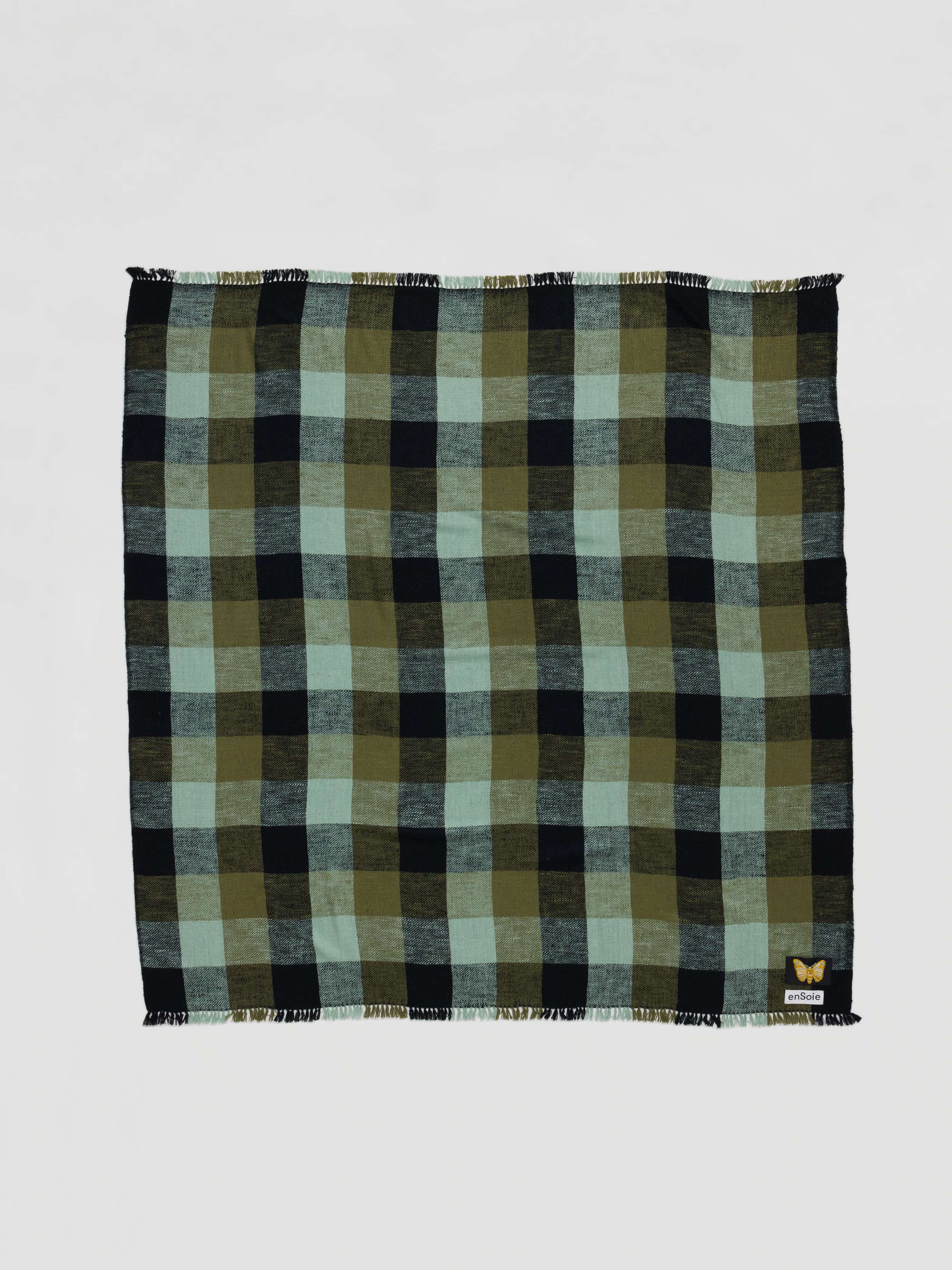 Picture of the square Blia handspun silk stole in a green check
