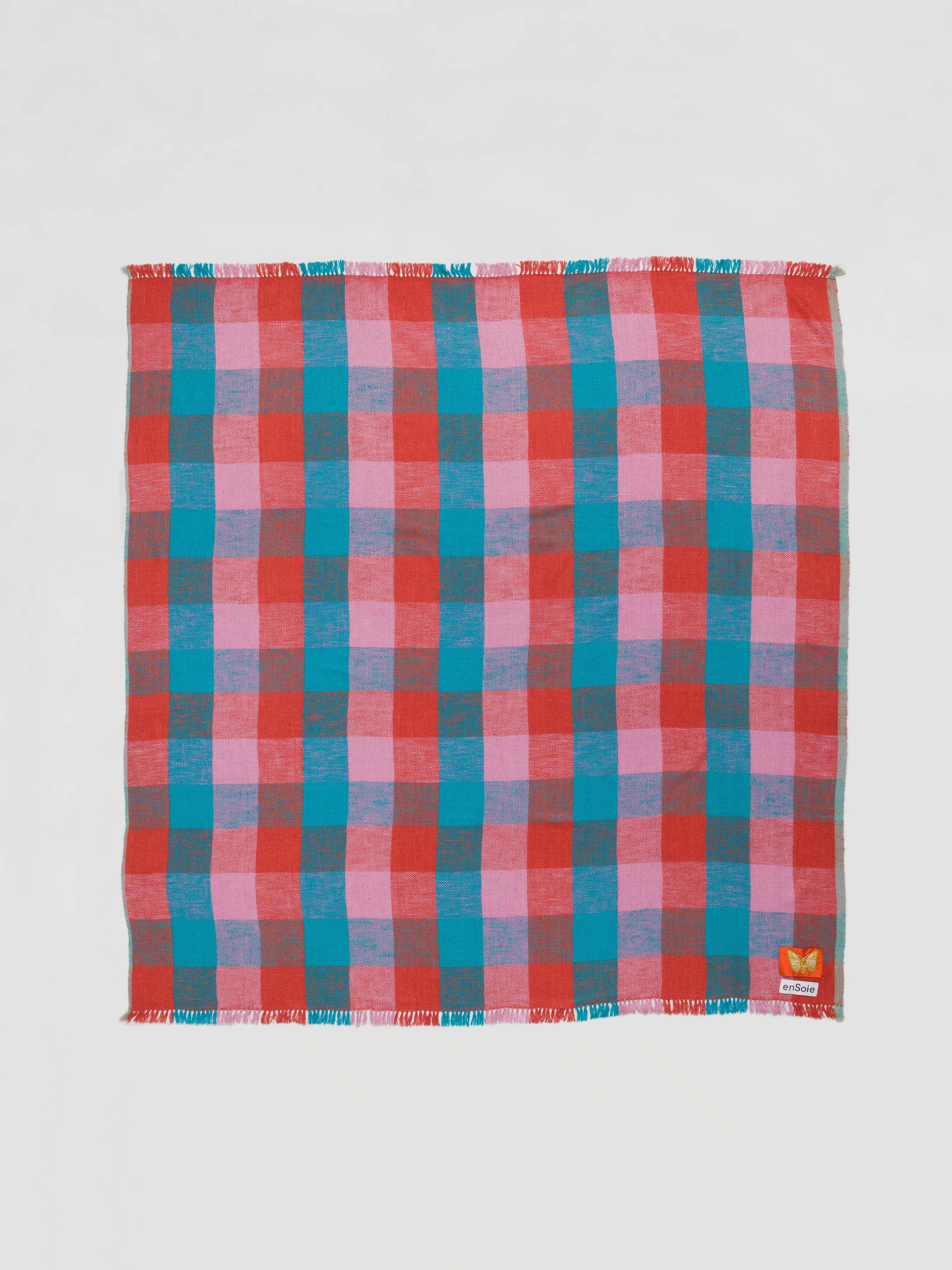 Picture of the square Blia handspun silk stole in pink orange teal check