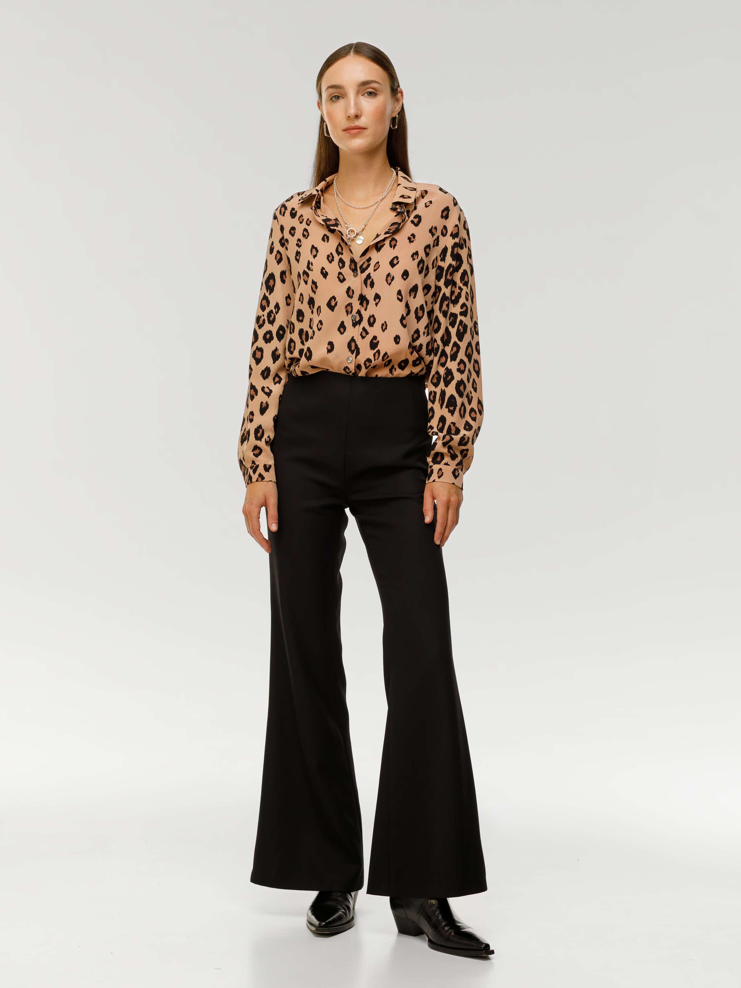 Angela trousers in black wool gabardine worn by model