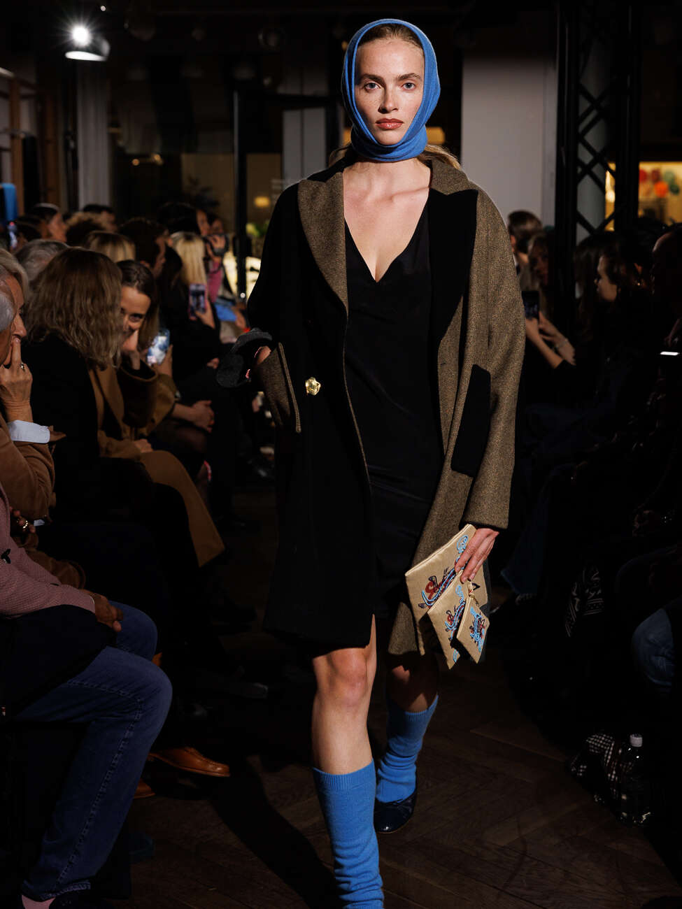 Model wearing wool coat at a fashion show